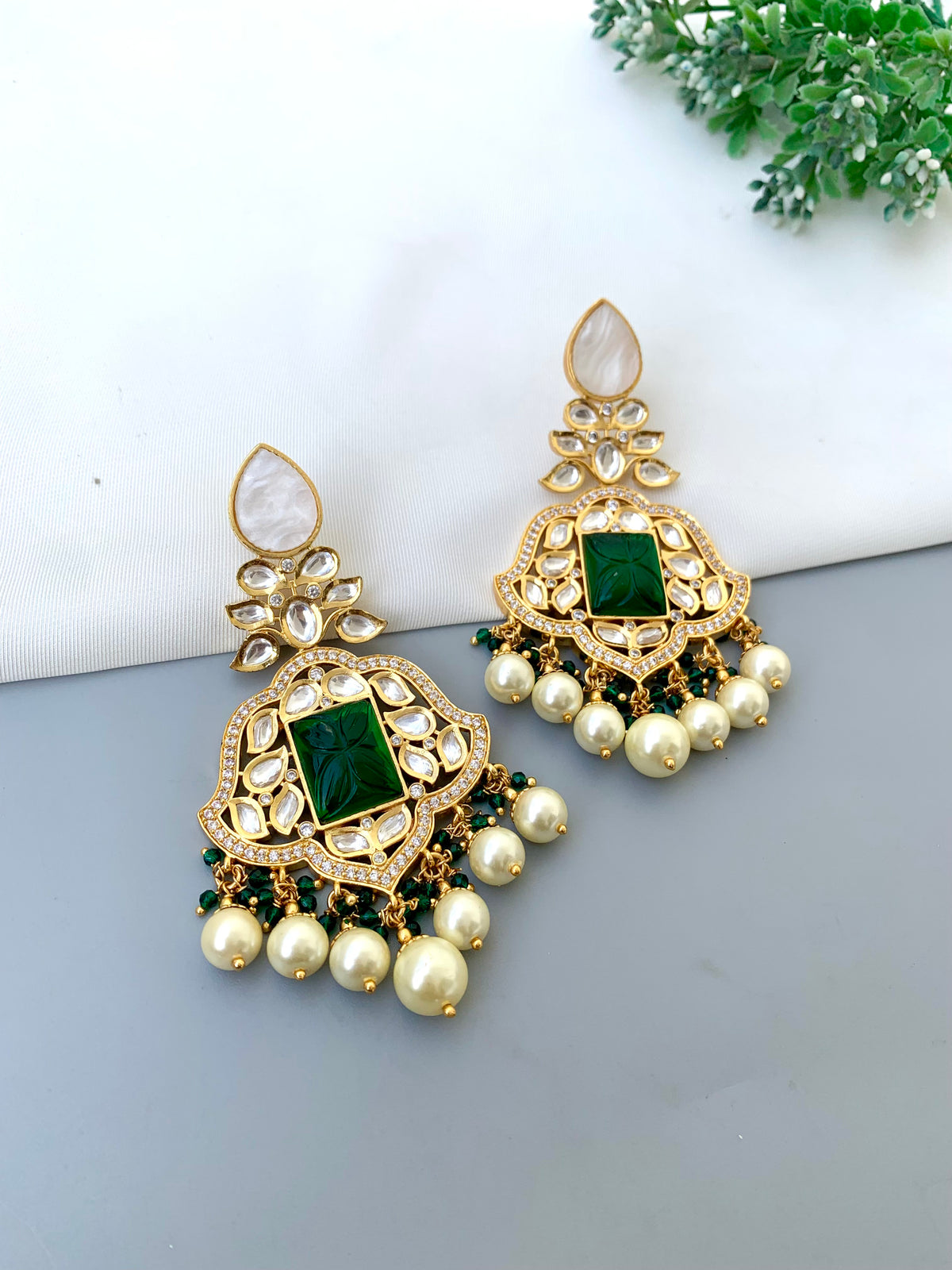 Nena handcrafted 22kt Gold plated earrings with Mother of Pearl, Polki Kundan, hand-carved Emerald and Pearls