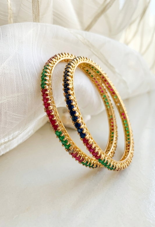 Handcrafted Neriah Bangles in 22kt gold plating with reverse Semi-Precious Ruby, Emerald, Sapphire, and Champagne stones
