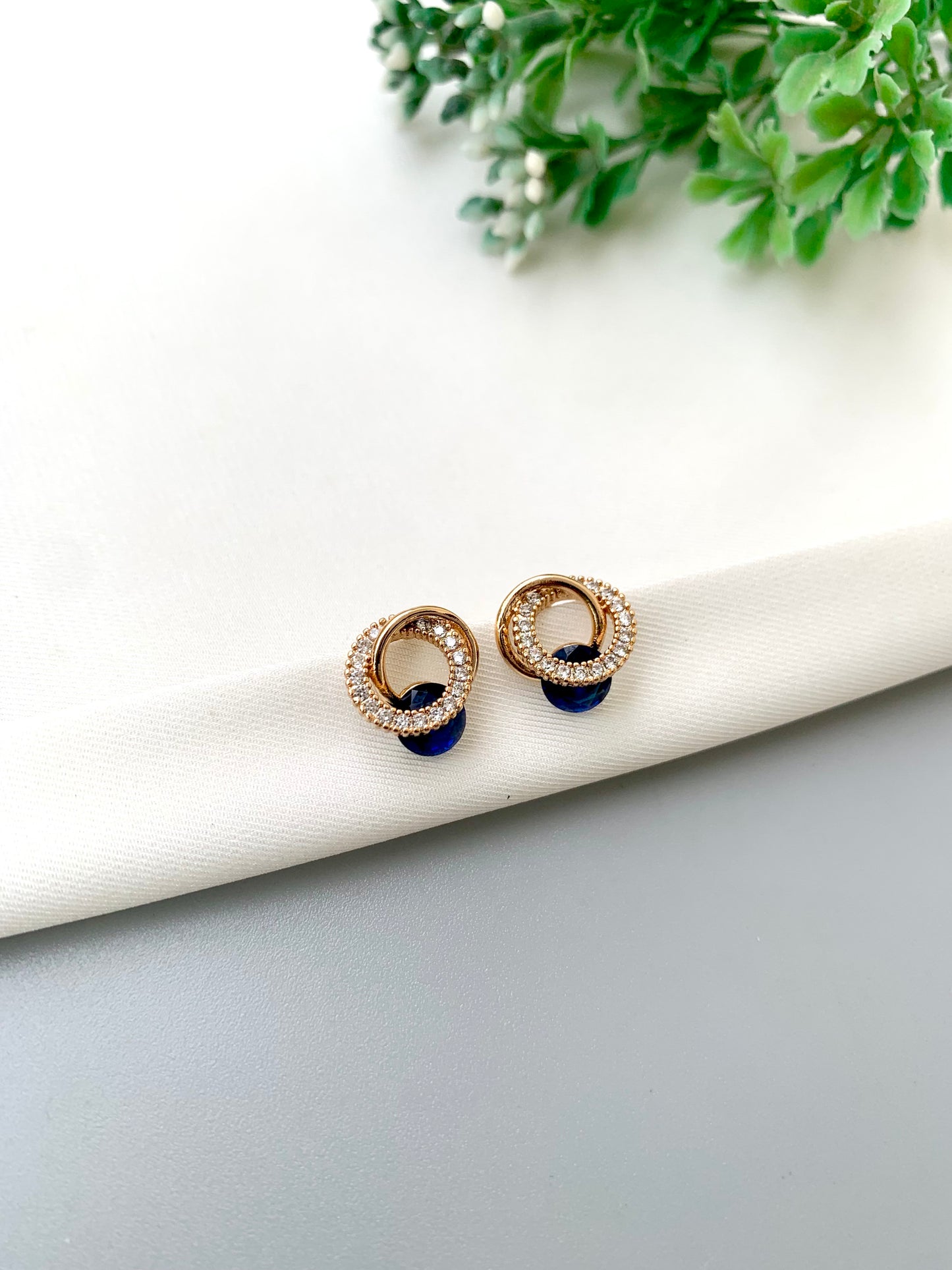 Noa handcrafted 22kt Victorian Gold plated gemstone stud earrings with American Diamonds in White, Sapphire, Emerald and Onyx variants
