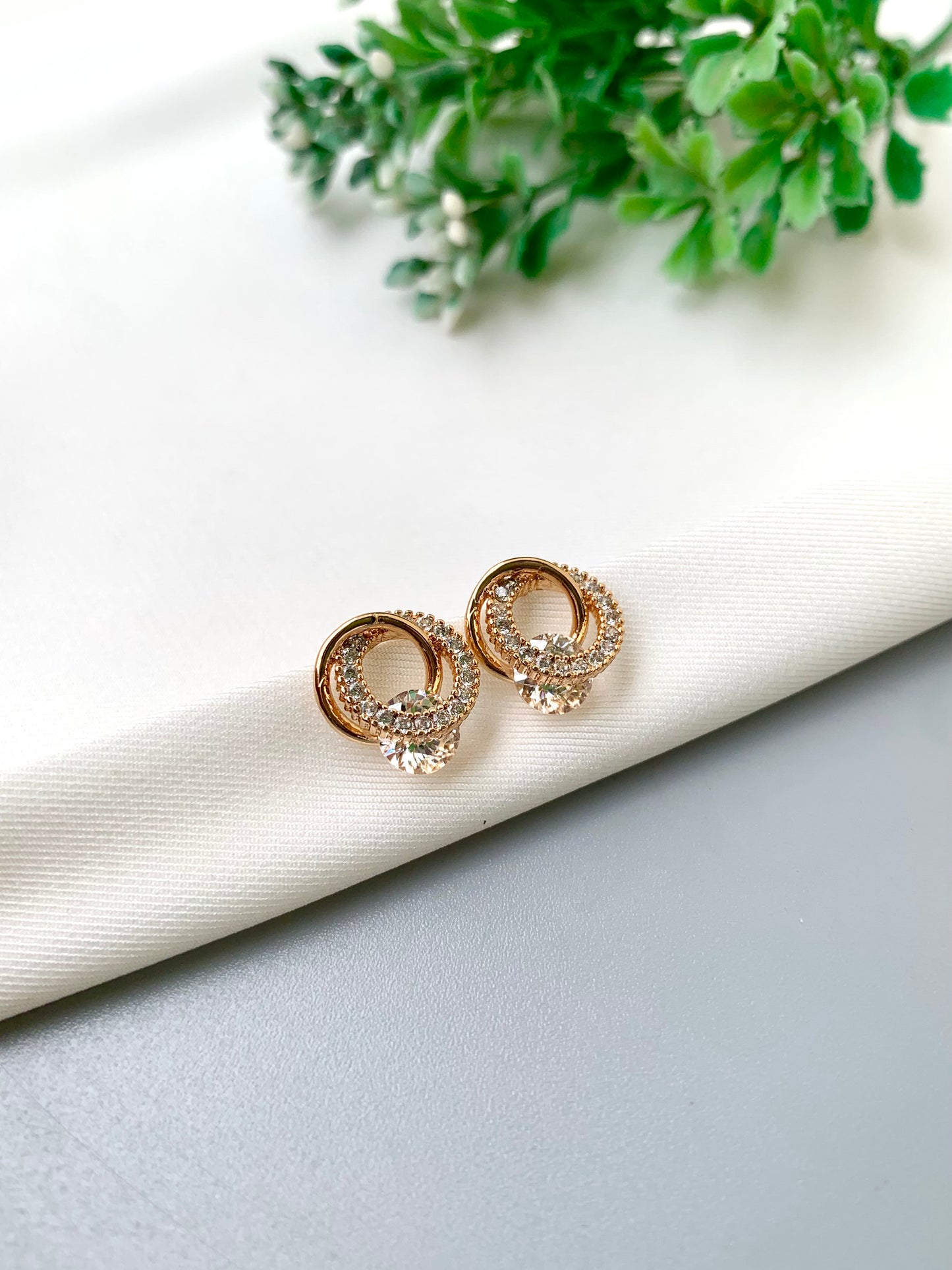 Noa handcrafted 22kt Victorian Gold plated gemstone stud earrings with American Diamonds in White, Sapphire, Emerald and Onyx variants