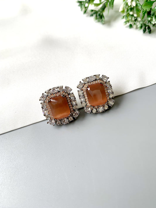 Handcrafted Noir Muse Studs with semi-precious Onyx center and American Diamonds in oxidized black rose gold plating, front view