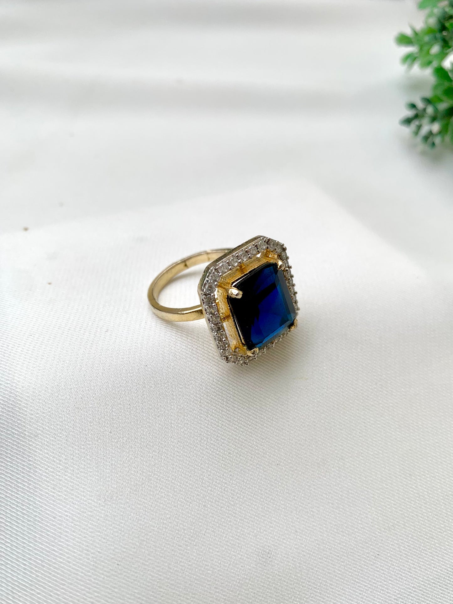 Nuha handcrafted 22kt gold plated adjustable ring with American Diamonds and semi-precious Sapphire