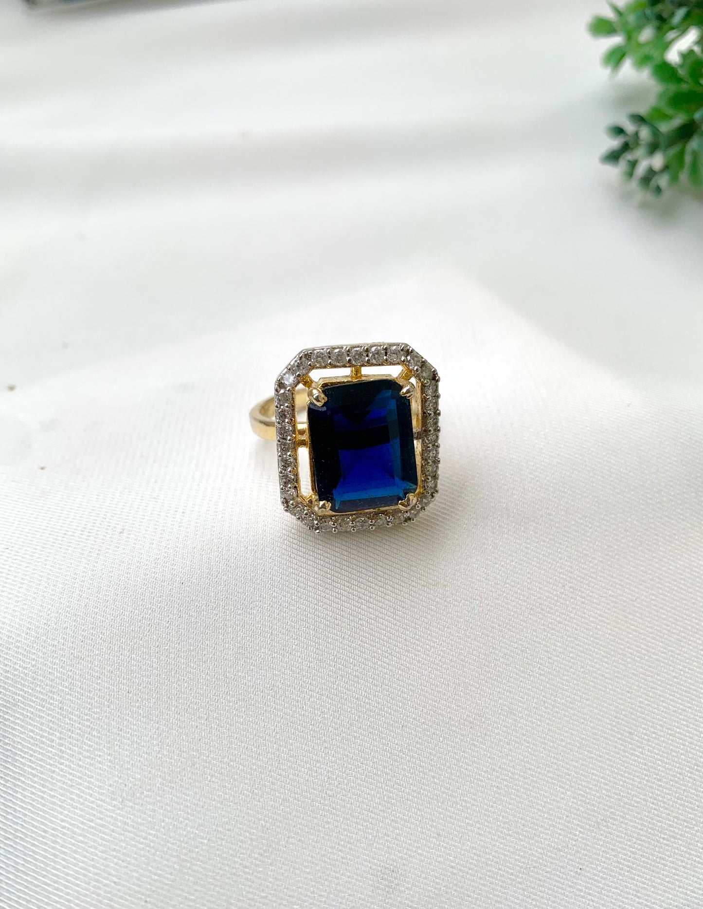 Nuha handcrafted 22kt gold plated adjustable ring with American Diamonds and semi-precious Sapphire
