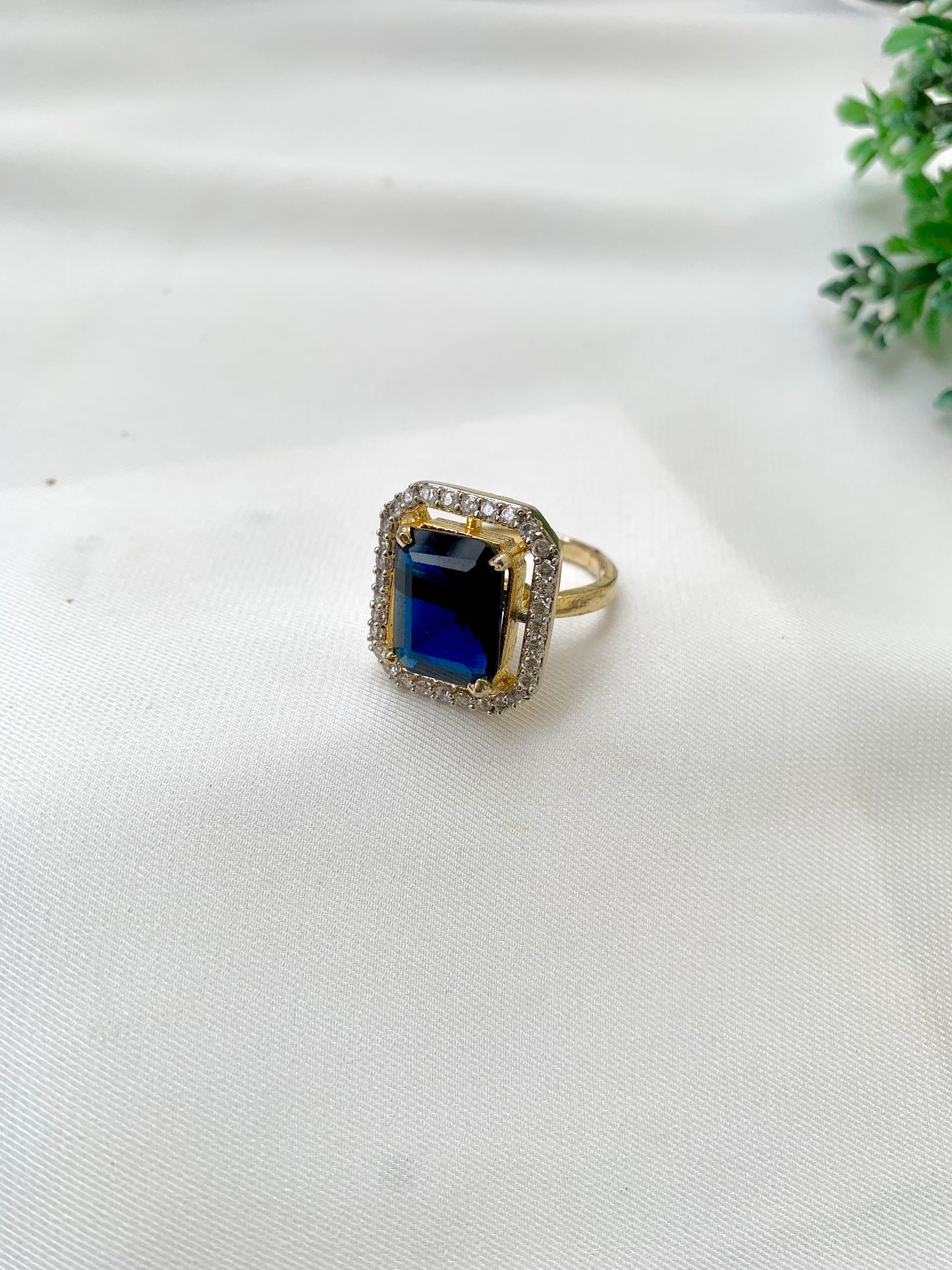 Nuha handcrafted 22kt gold plated adjustable ring with American Diamonds and semi-precious Sapphire
