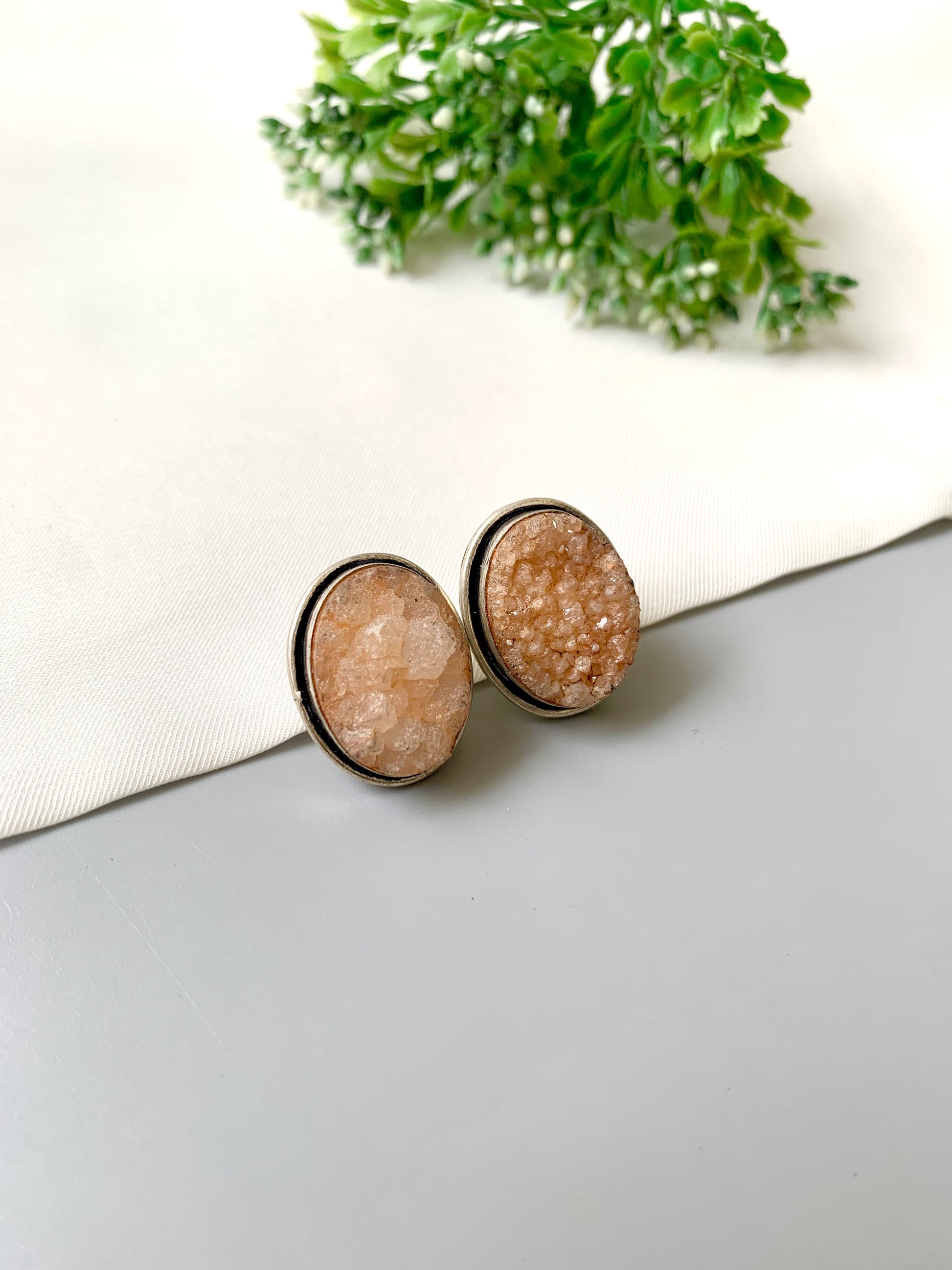 Nyra Soleil Druzy Studs in rhodium plating with natural peach druzy gemstone by Zamal Jewels