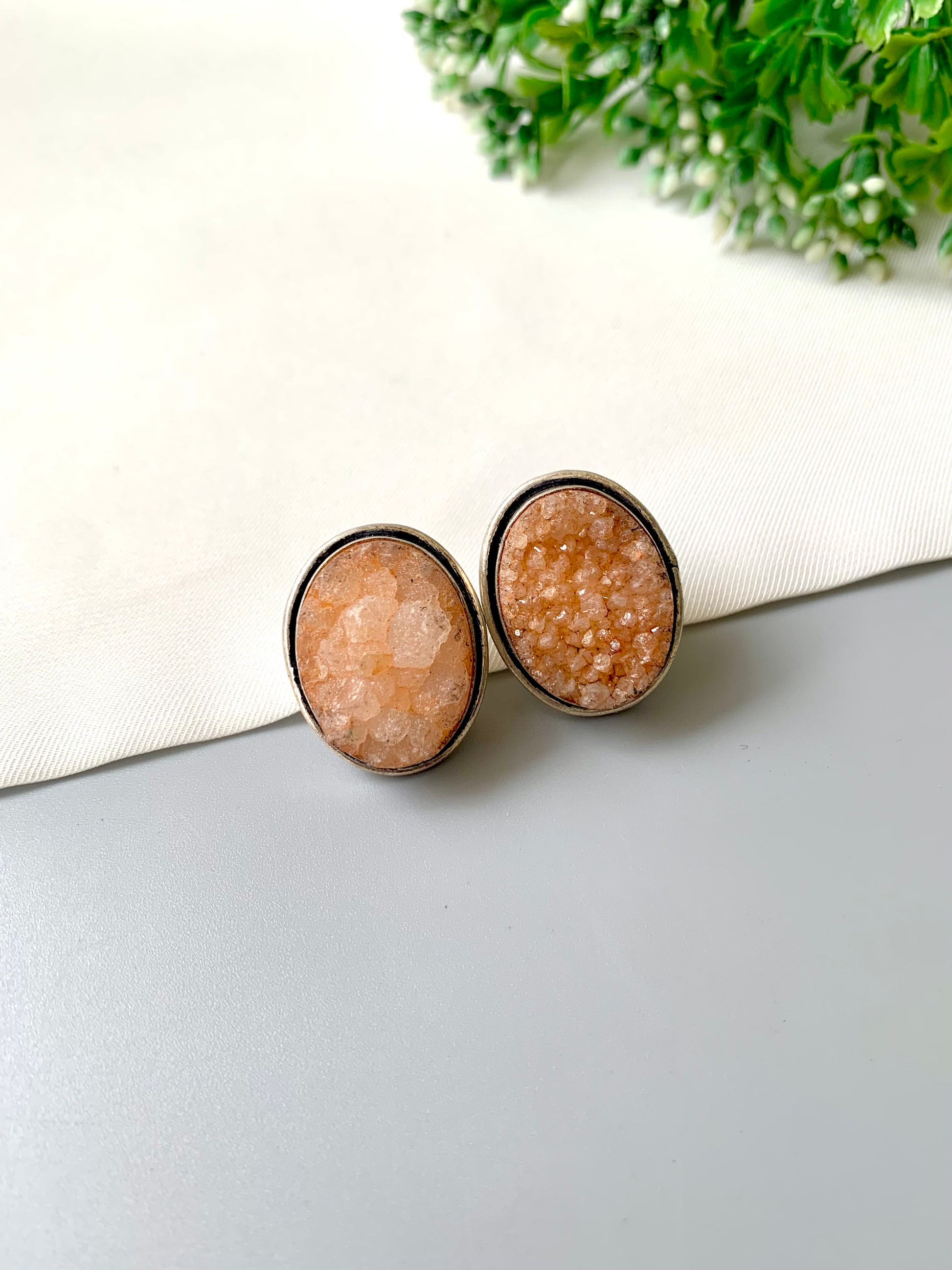 Nyra Soleil Druzy Studs in rhodium plating with natural peach druzy gemstone by Zamal Jewels