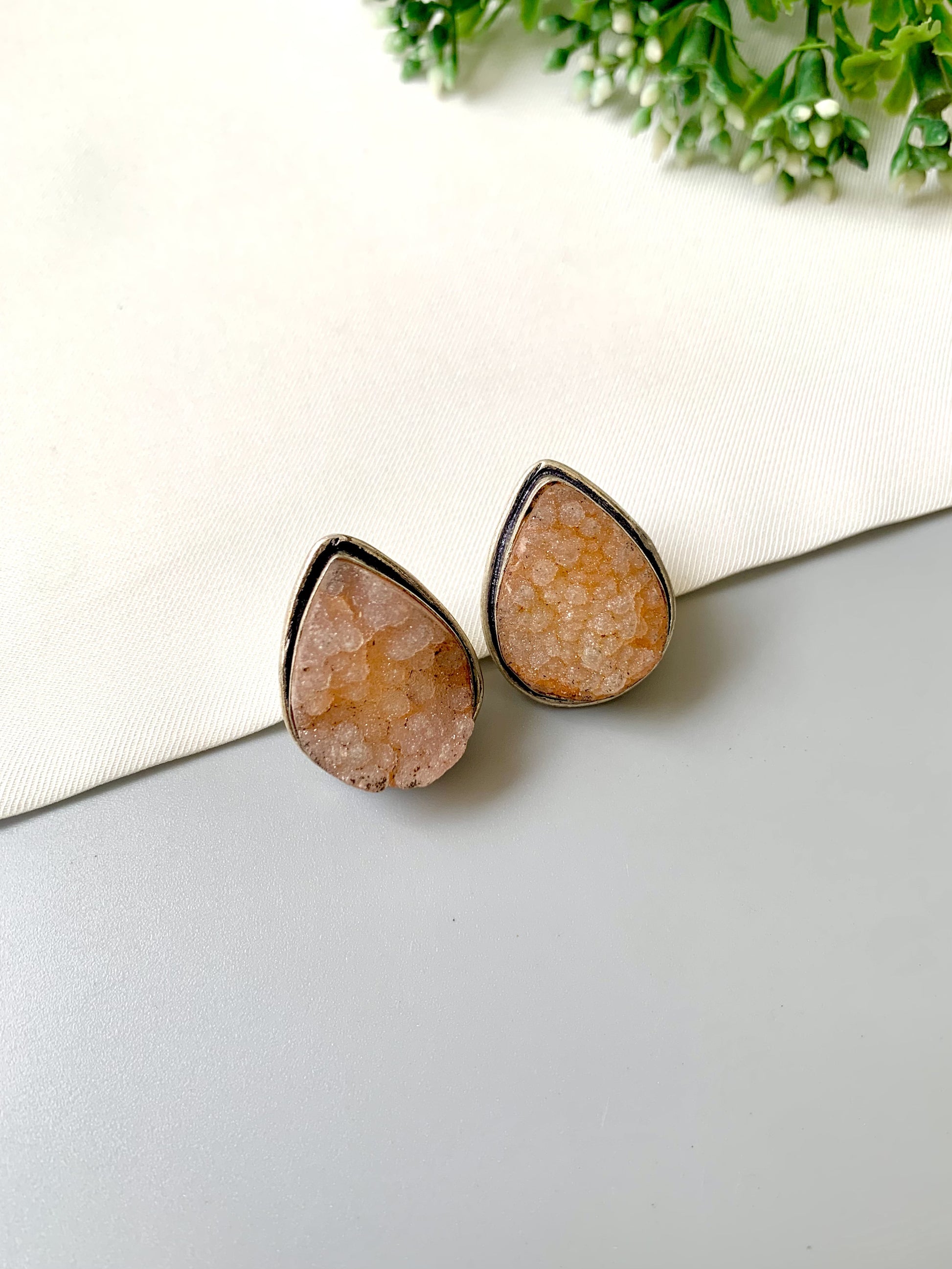 Nyra Teardrop Druzy Studs in rhodium plating with natural druzy gemstone by Zamal Jewels