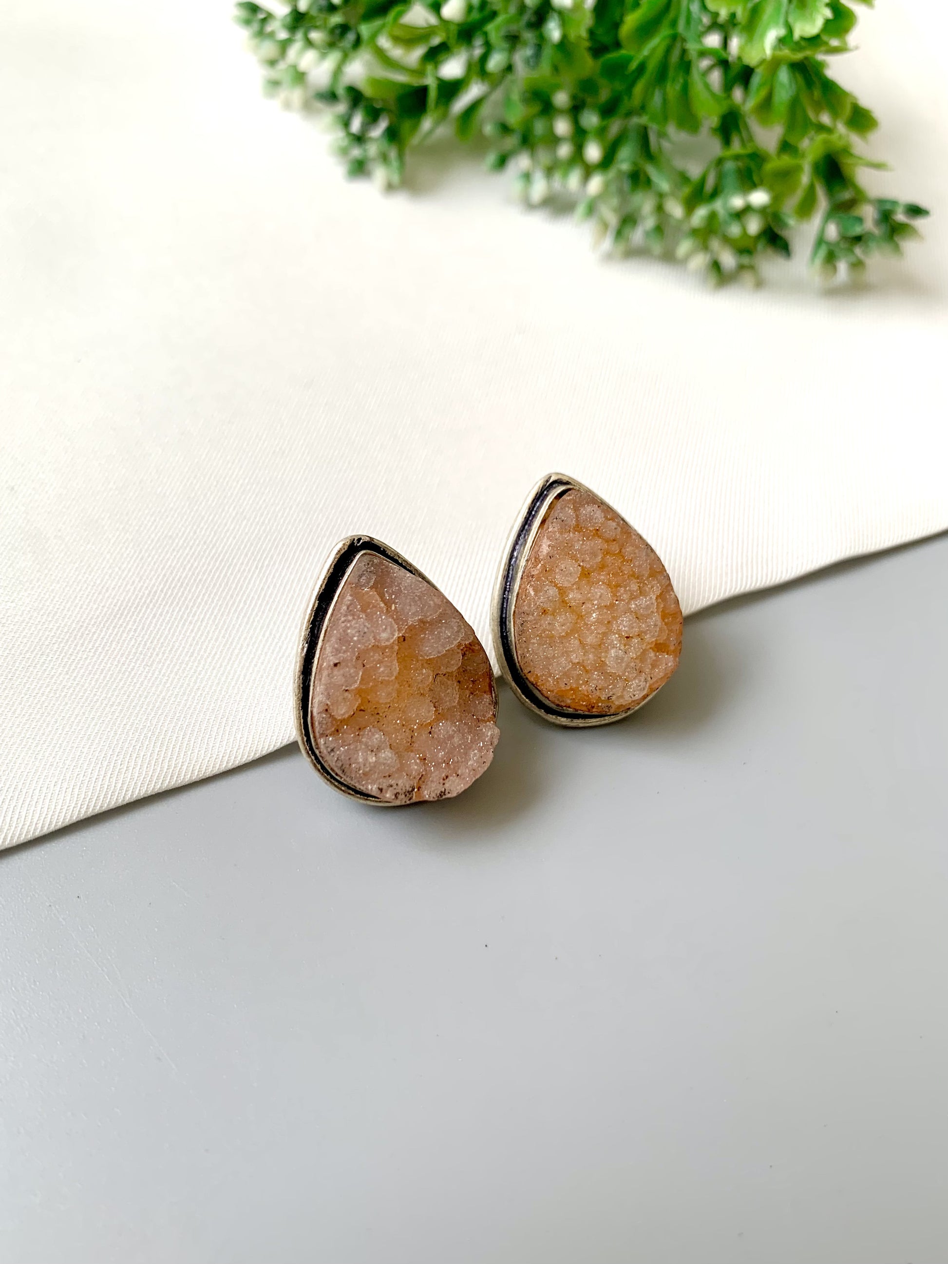 Nyra Teardrop Druzy Studs in rhodium plating with natural druzy gemstone by Zamal Jewels