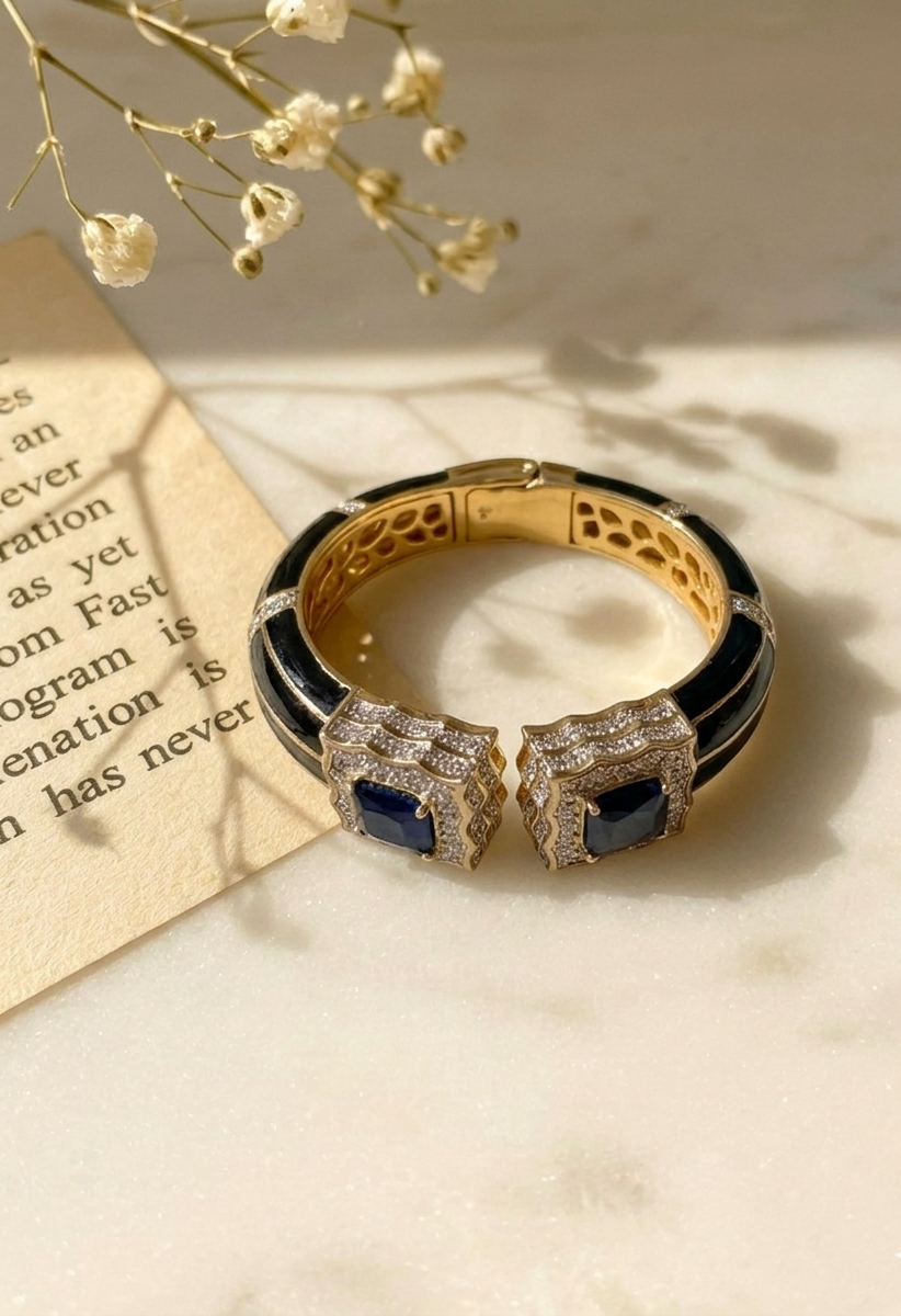 Railey designer bangle in 22kt gold plating with American diamonds, sapphire stones and hand painted meena