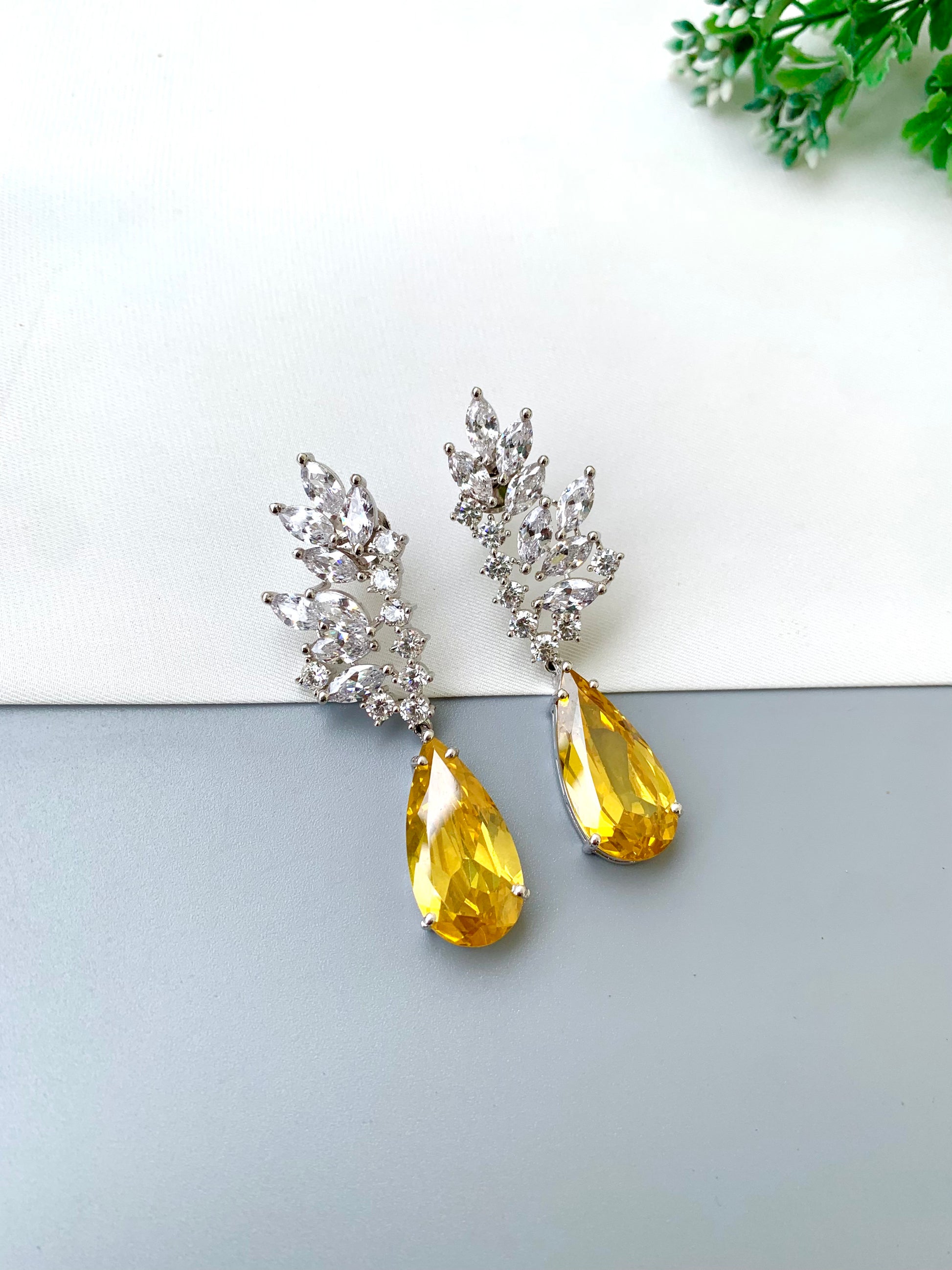Rehma handcrafted rhodium plated earrings with diamond polish, American Diamonds and semi-precious Citrine