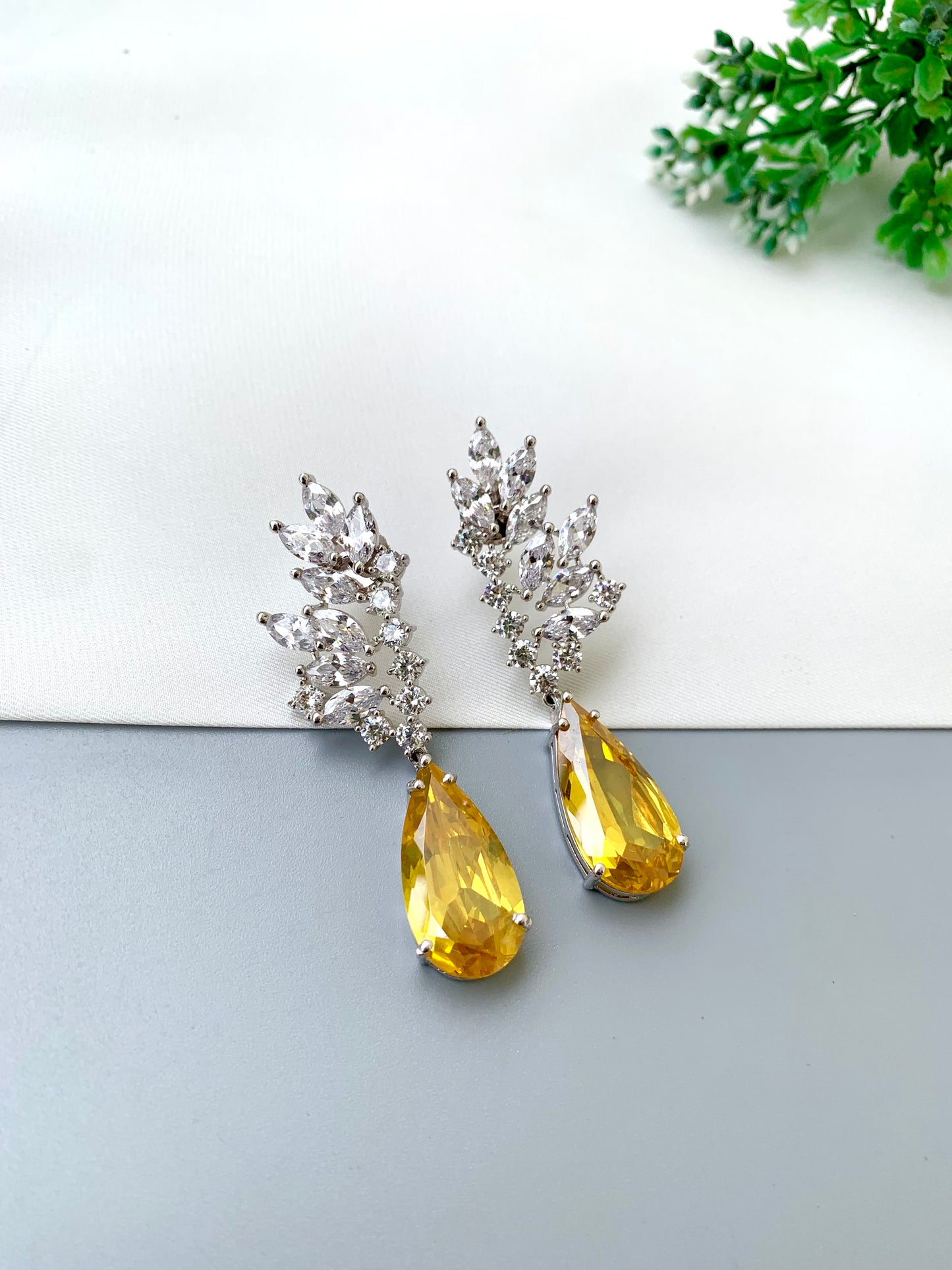 Rehma handcrafted rhodium plated earrings with diamond polish, American Diamonds and semi-precious Citrine