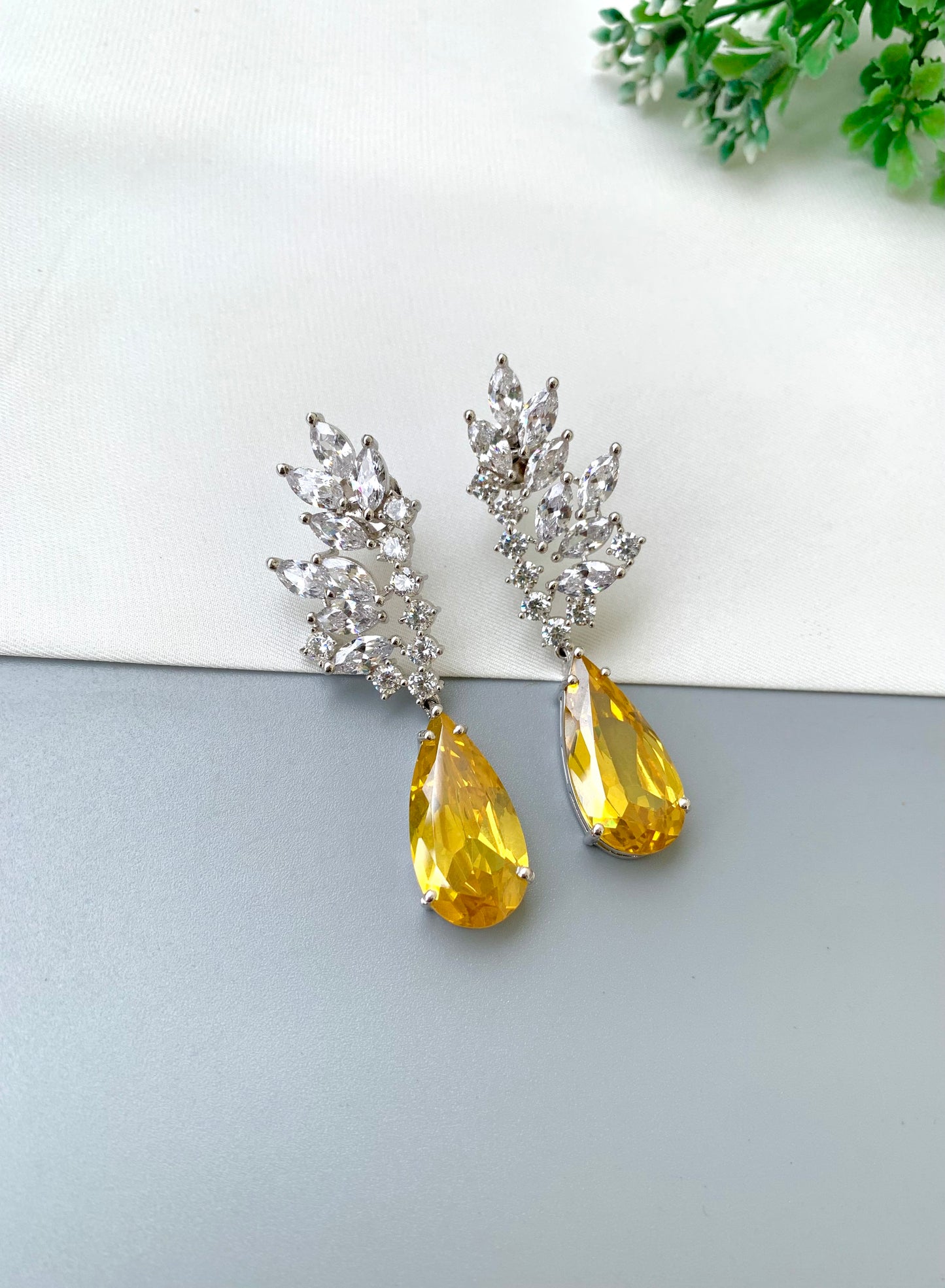 Rehma handcrafted rhodium plated earrings with diamond polish, American Diamonds and semi-precious Citrine