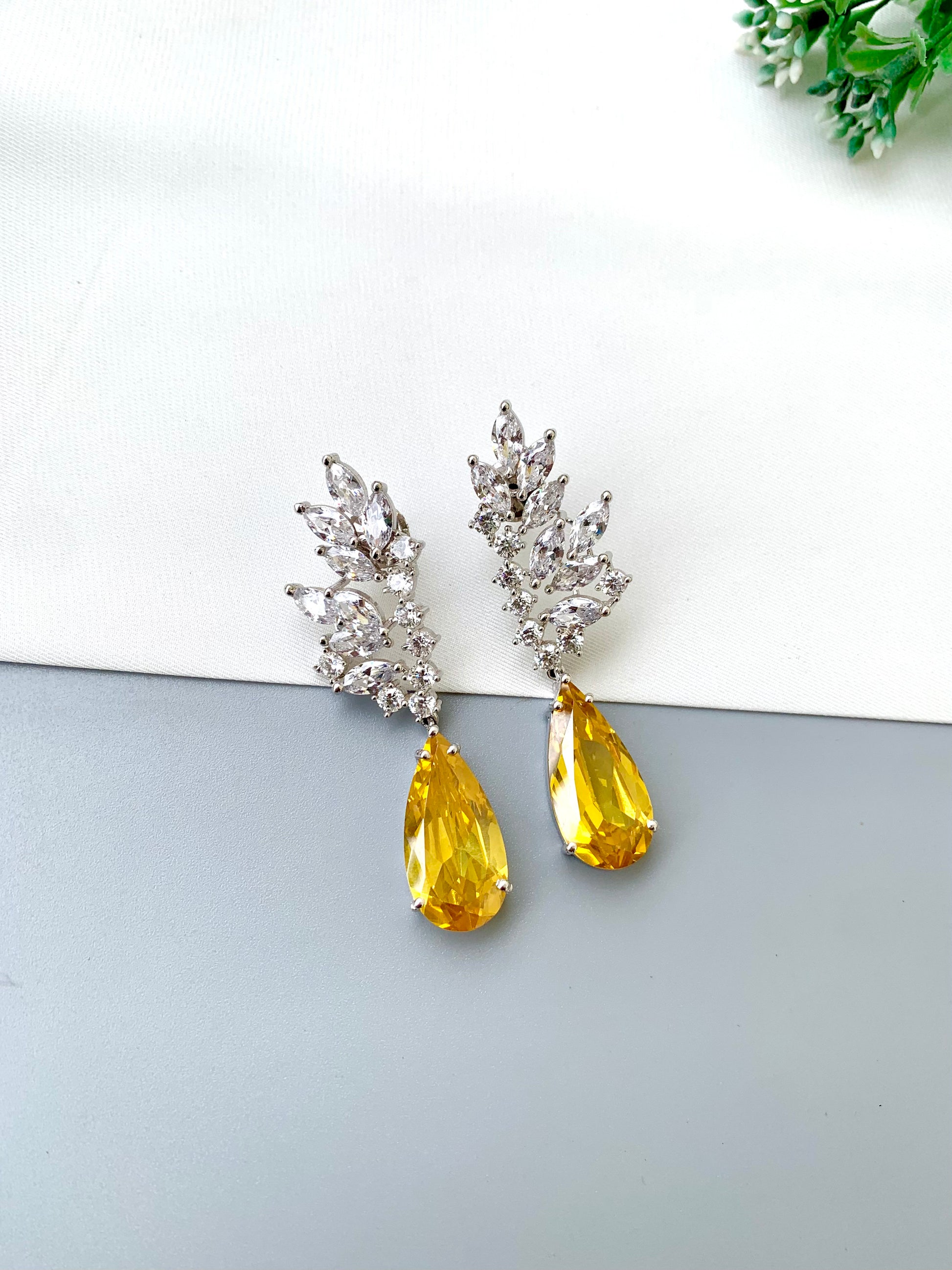 Rehma handcrafted rhodium plated earrings with diamond polish, American Diamonds and semi-precious Citrine