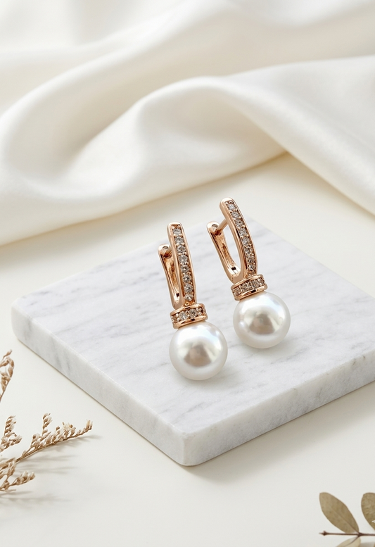 Renu rose gold plated studs with American diamonds and pearl accents