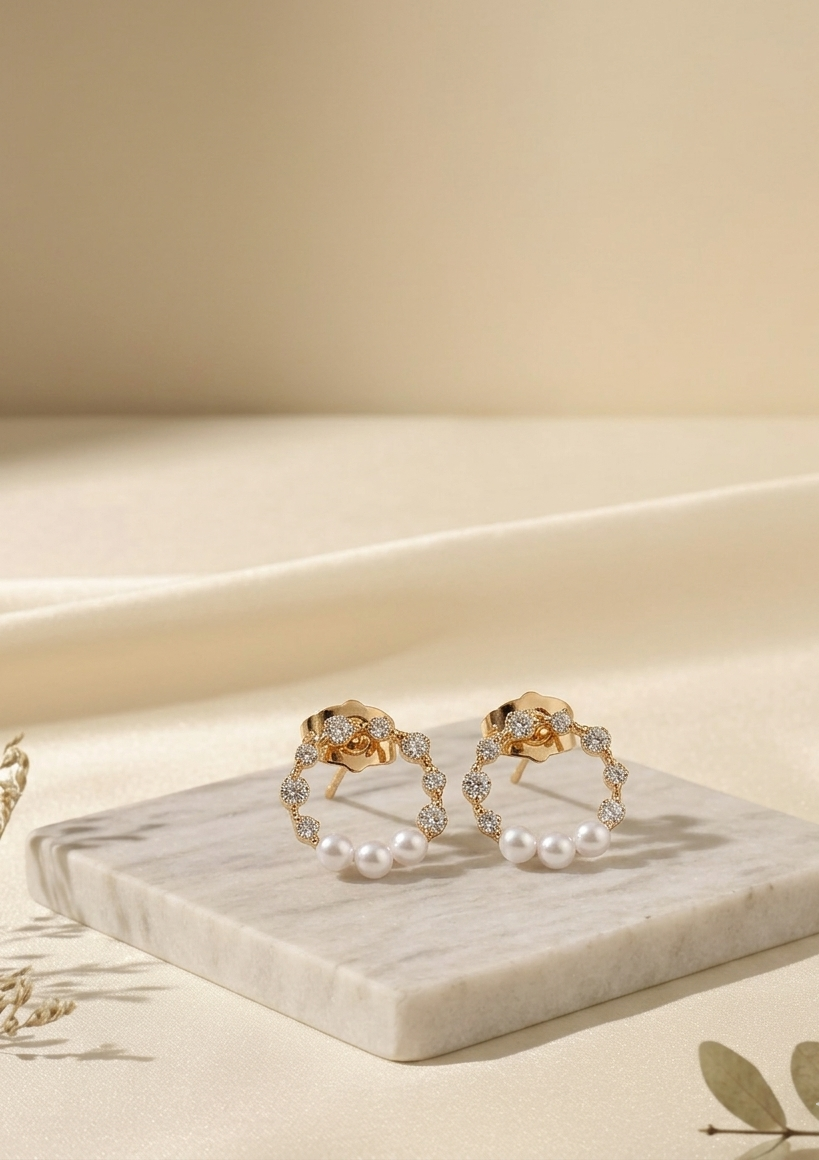 Ria tiny gold plated studs with American diamonds and pearl accents