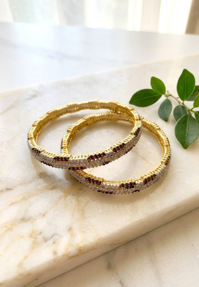 Riley handcrafted 22kt gold plated bangles with American Diamonds and semi-precious Rubies, sold as a pair