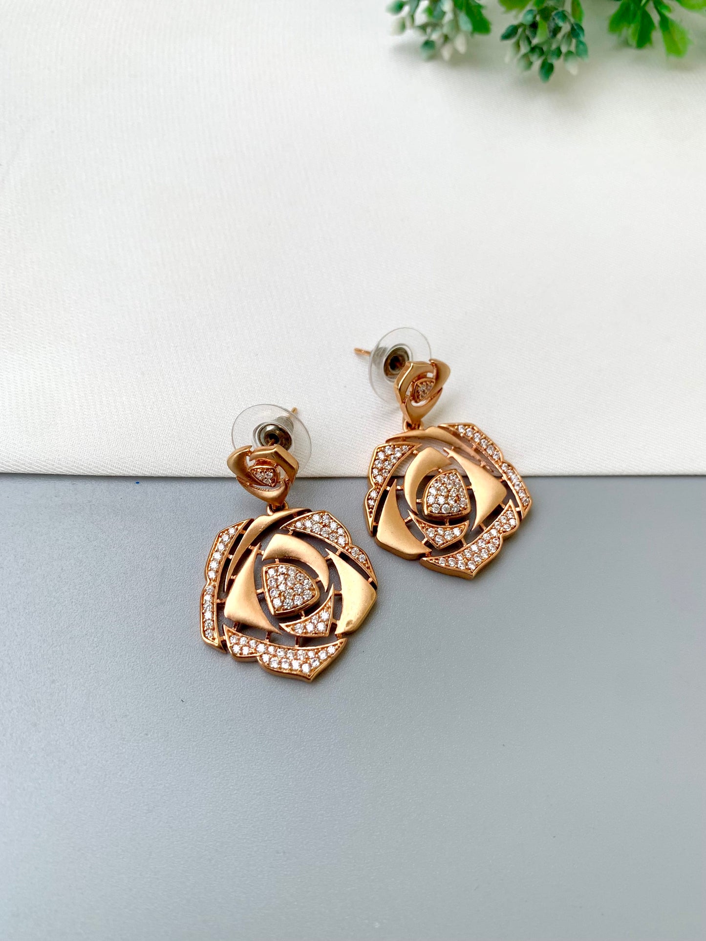 Rose handcrafted 22kt Rose Gold plated earrings with high-quality American Diamonds and intricate rose design