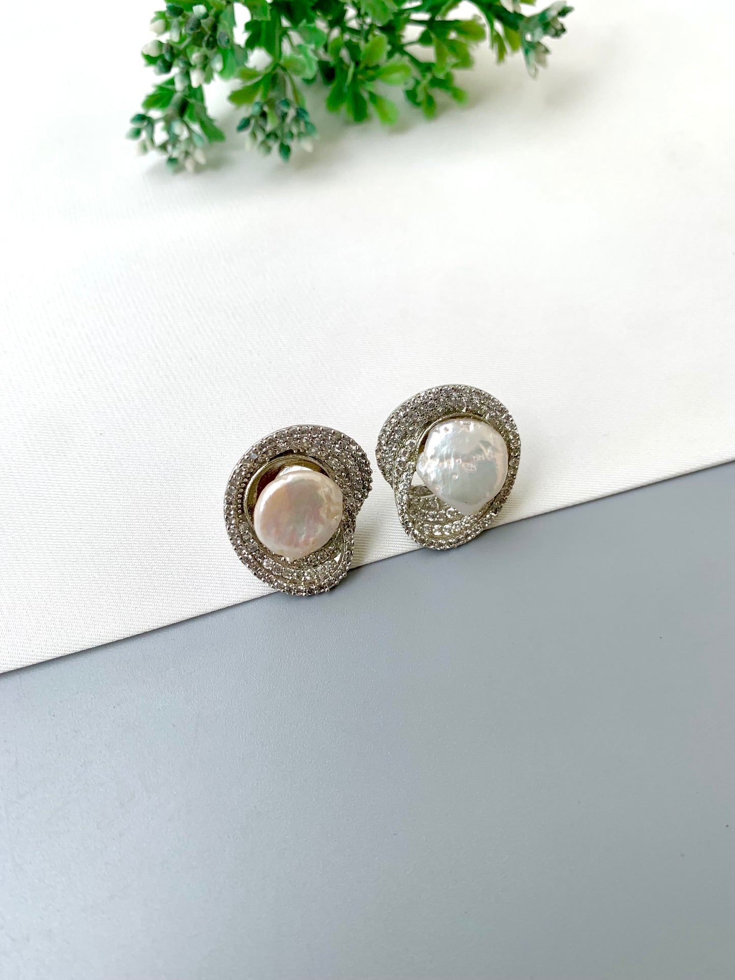 Samna handcrafted rhodium plated studs with diamond finish, American Diamonds and real Baroque Pearls with screw-back closure