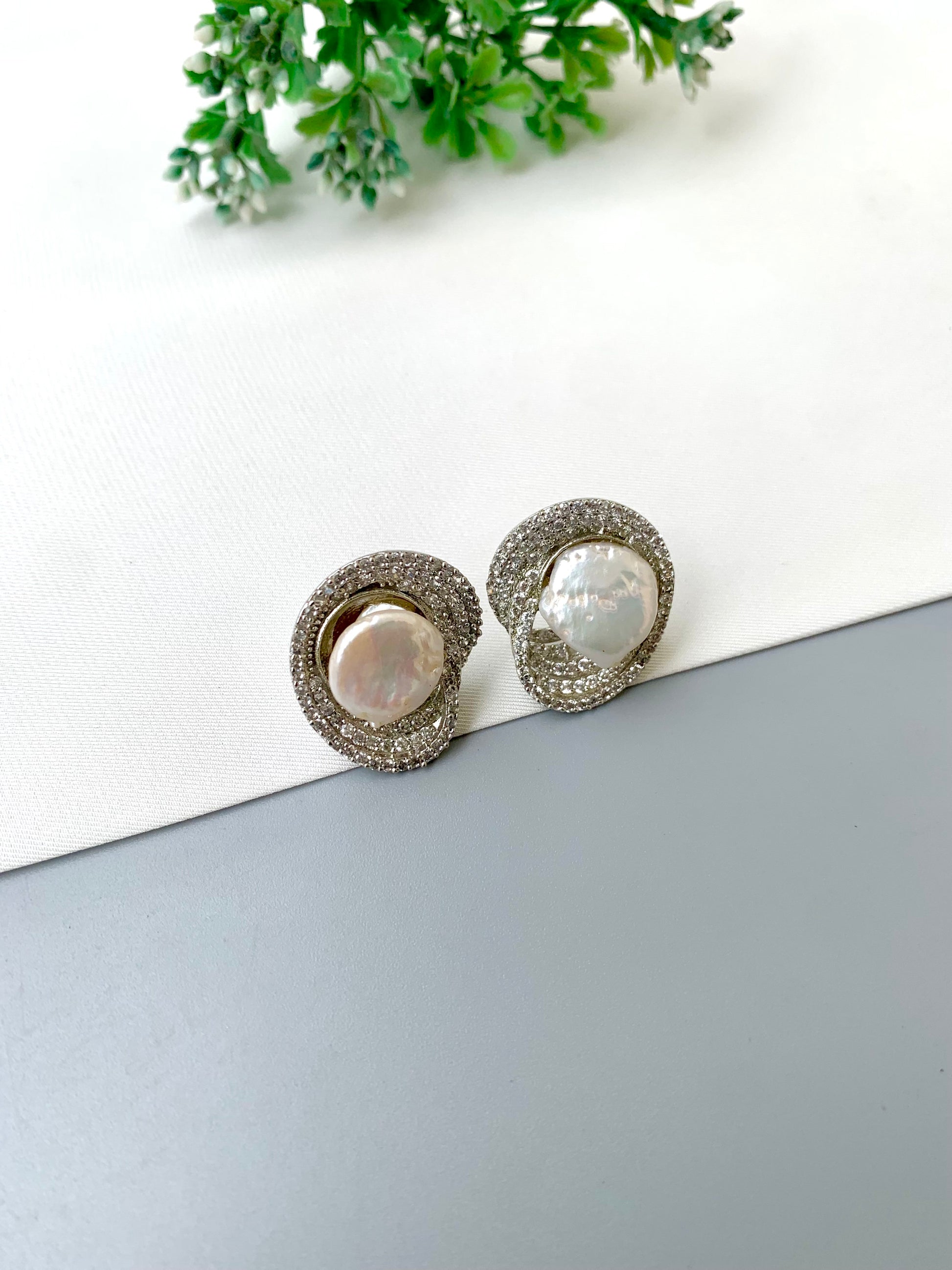 Samna handcrafted rhodium plated studs with diamond finish, American Diamonds and real Baroque Pearls with screw-back closure