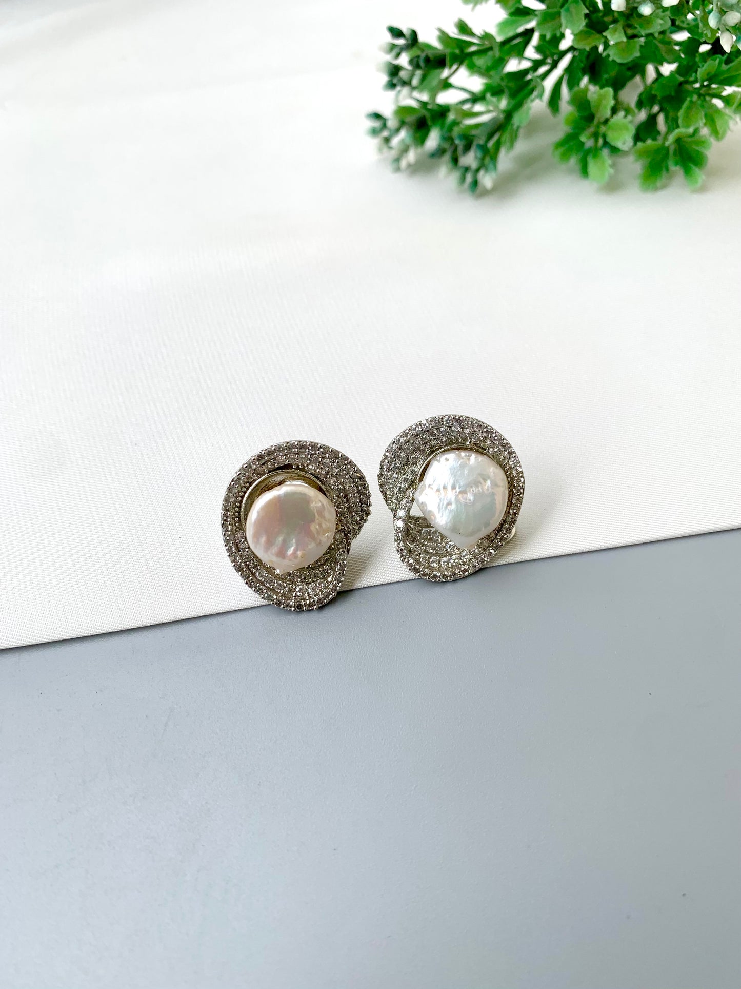 Samna handcrafted rhodium plated studs with diamond finish, American Diamonds and real Baroque Pearls with screw-back closure