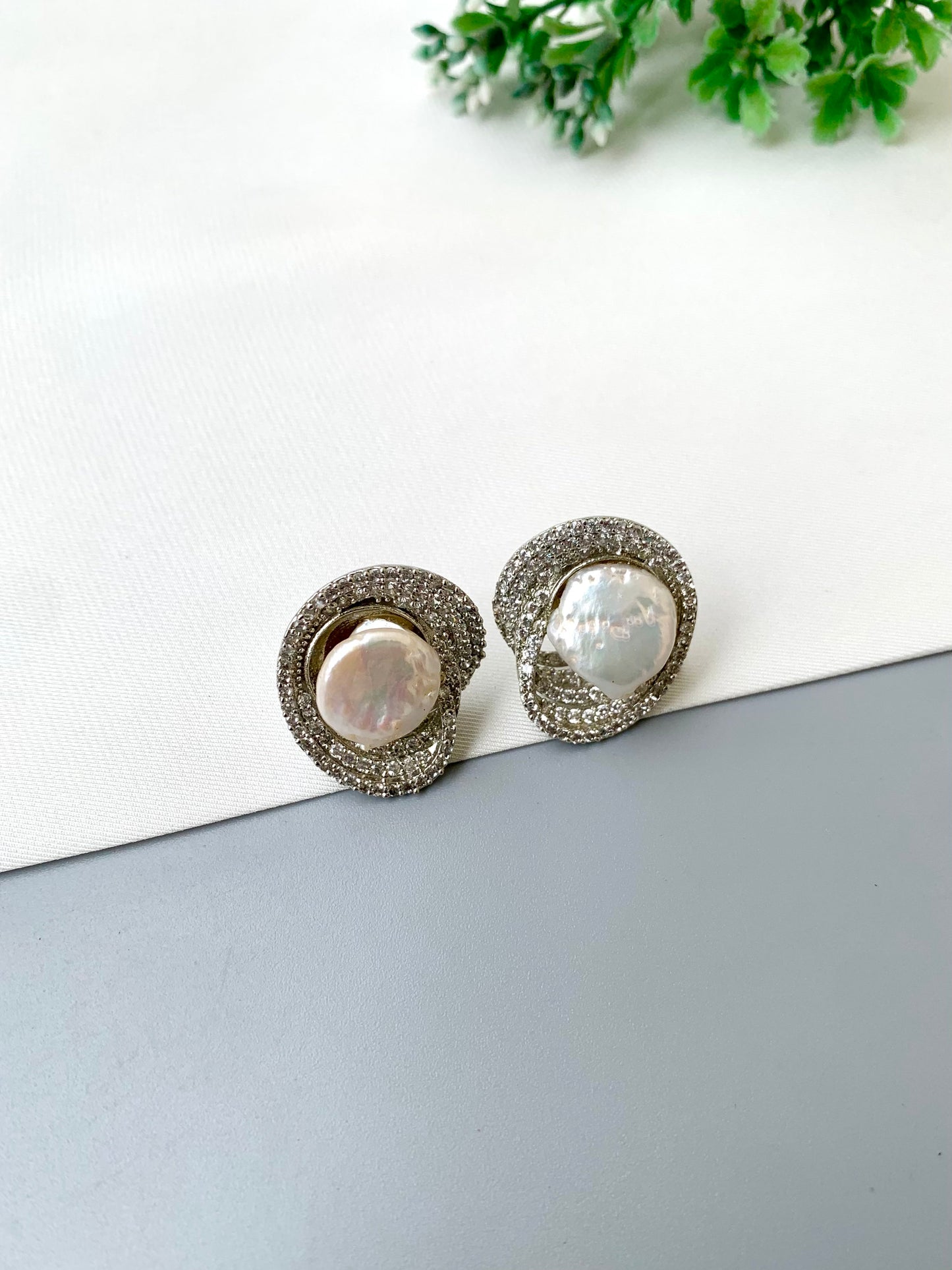 Samna handcrafted rhodium plated studs with diamond finish, American Diamonds and real Baroque Pearls with screw-back closure