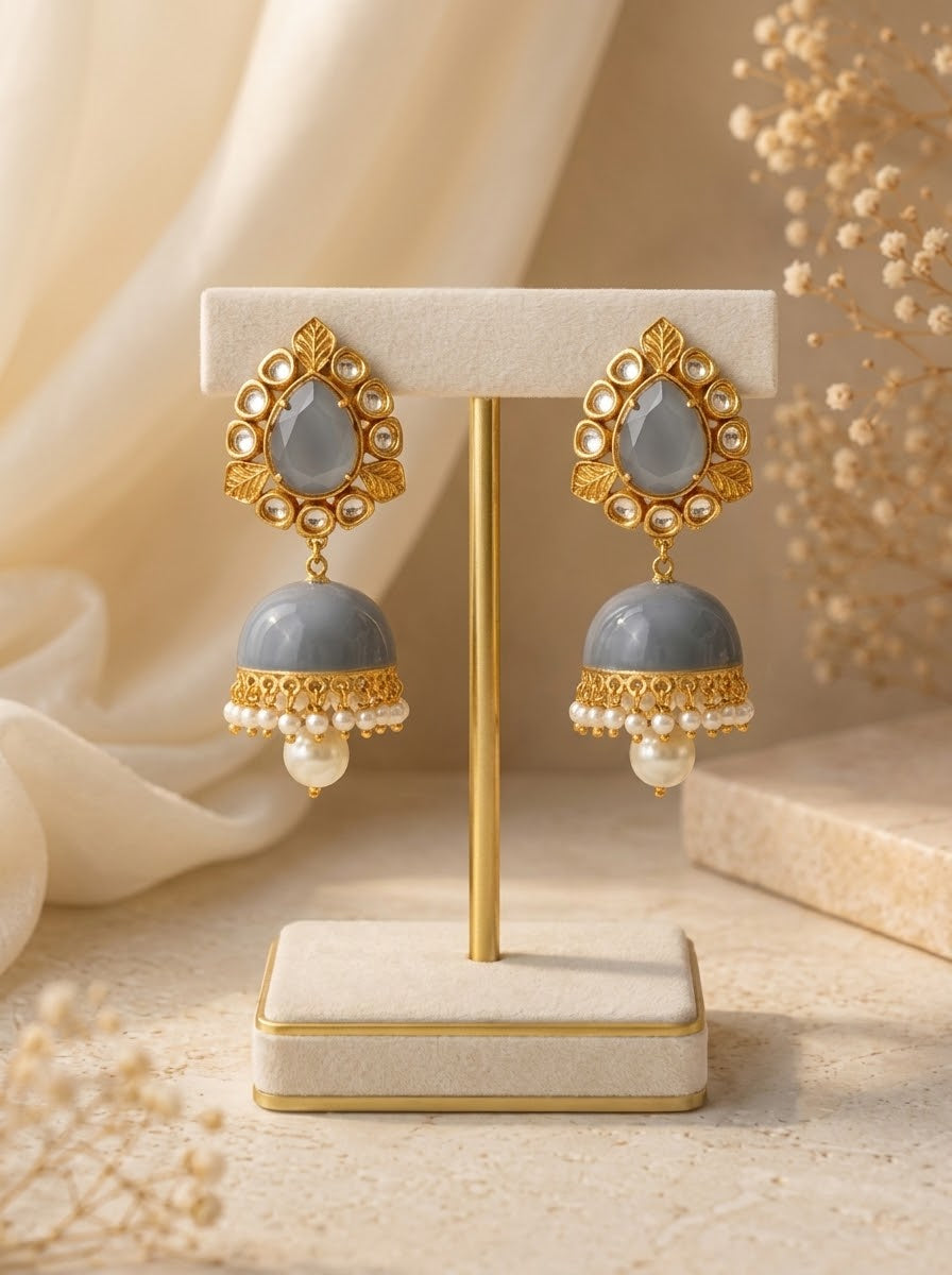 Seren handcrafted 22kt gold plated Jhumka featuring Polki Kundan, semi-precious Grey Onyx and Pearls