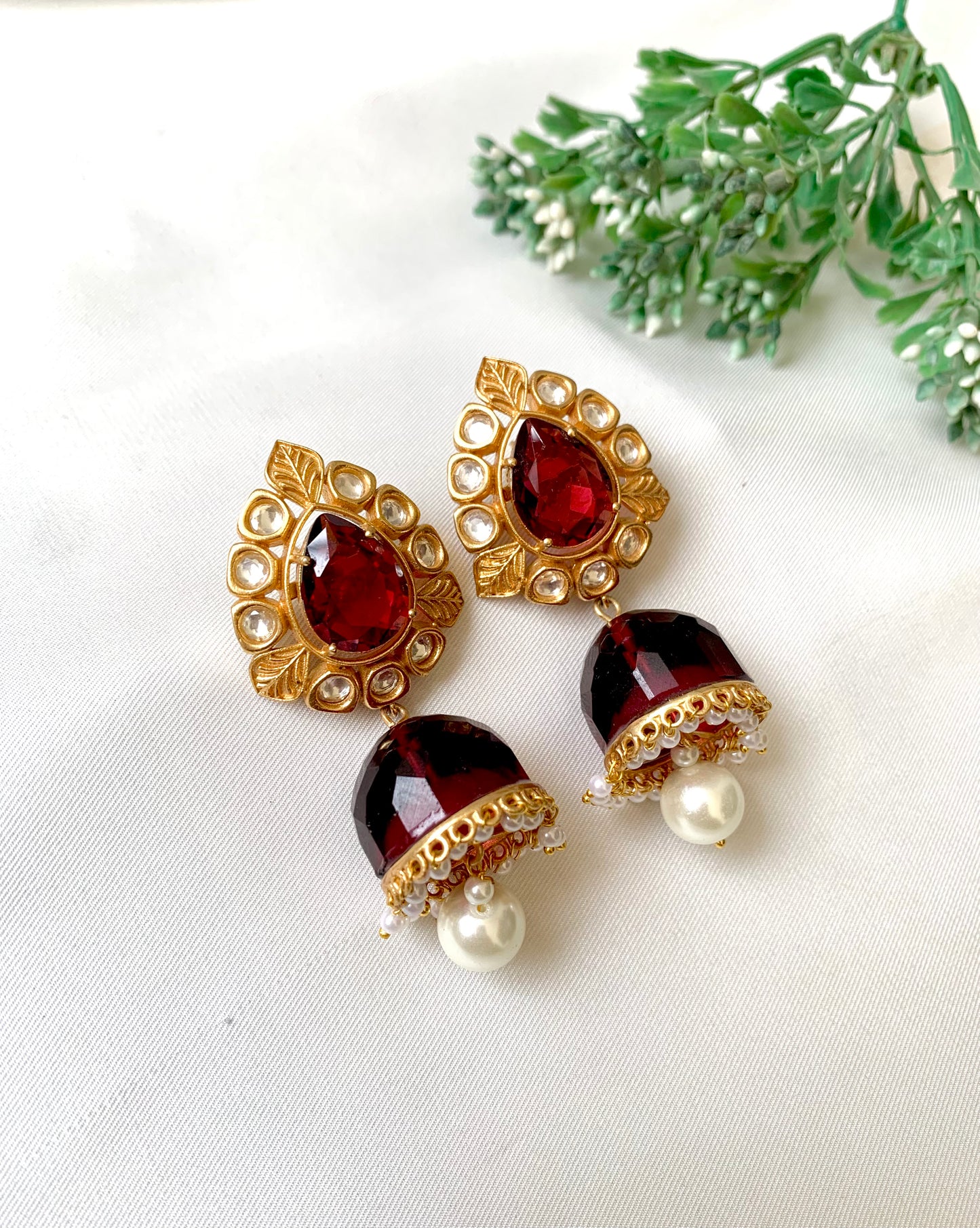 Seren handcrafted 22kt gold plated Jhumka featuring Polki Kundan, semi-precious Ruby and Pearls