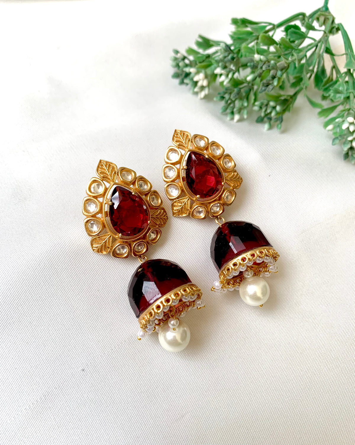Seren handcrafted 22kt gold plated Jhumka featuring Polki Kundan, semi-precious Ruby and Pearls