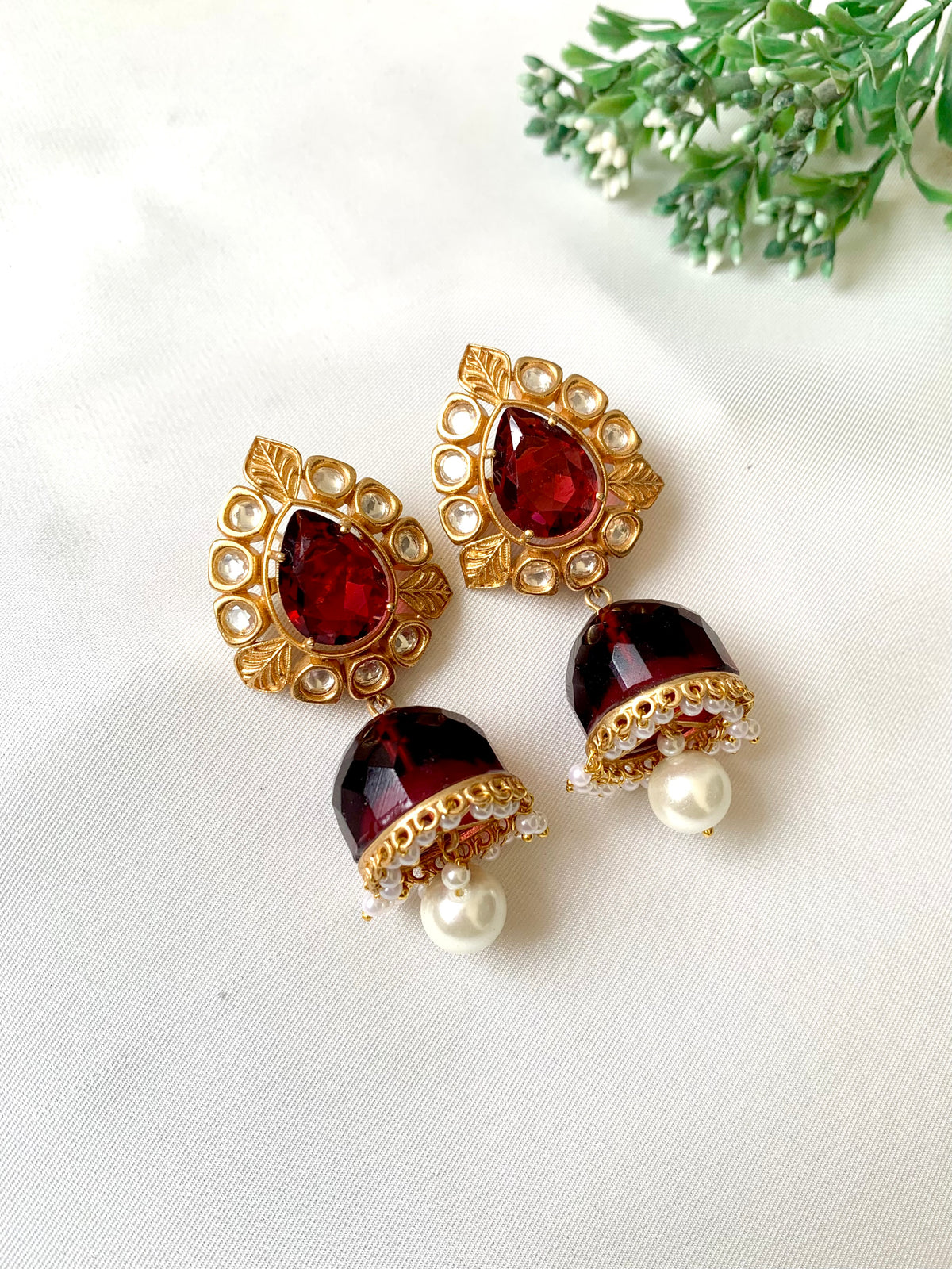 Seren handcrafted 22kt gold plated Jhumka featuring Polki Kundan, semi-precious Ruby and Pearls