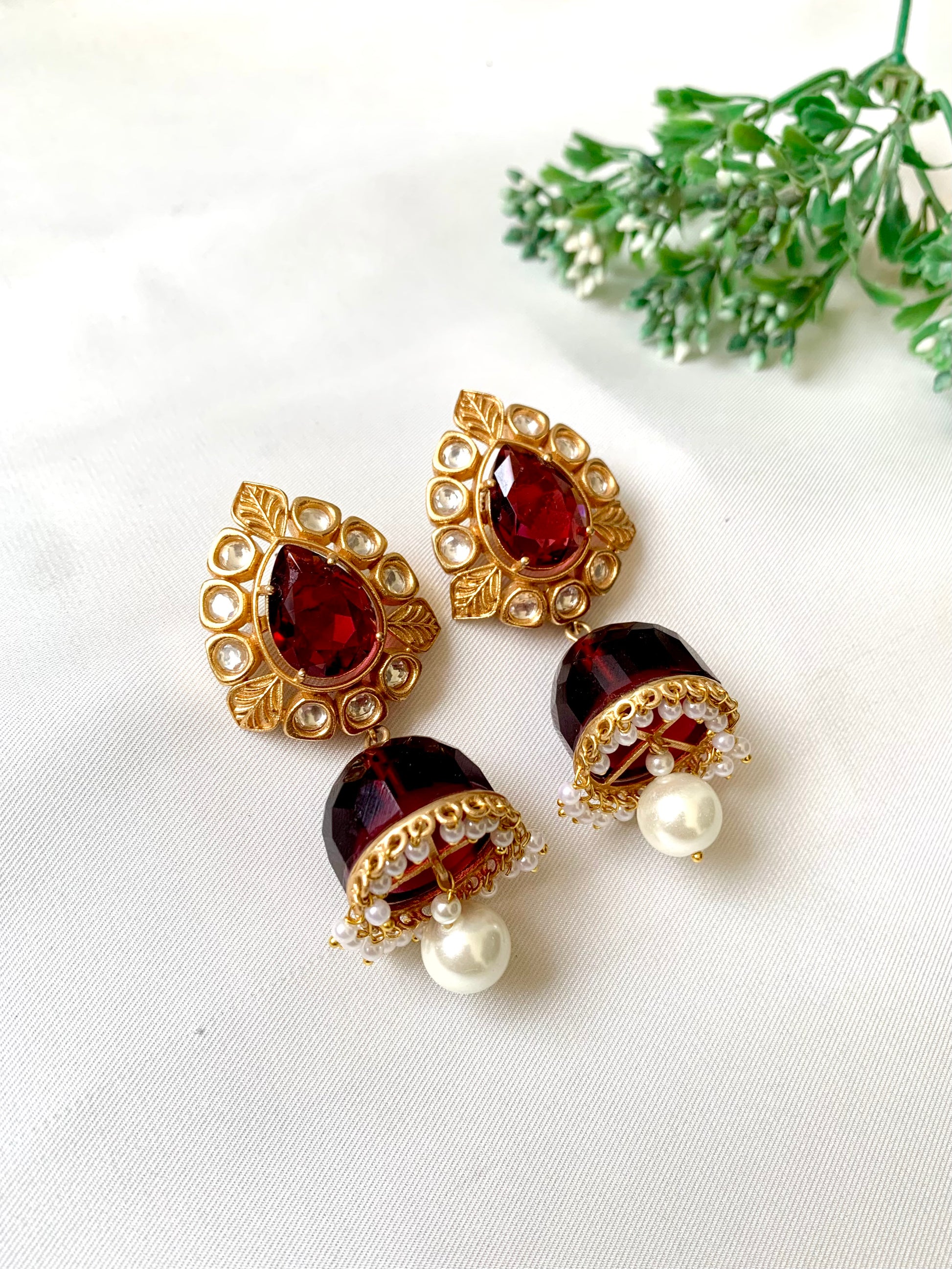 Seren handcrafted 22kt gold plated Jhumka featuring Polki Kundan, semi-precious Ruby and Pearls