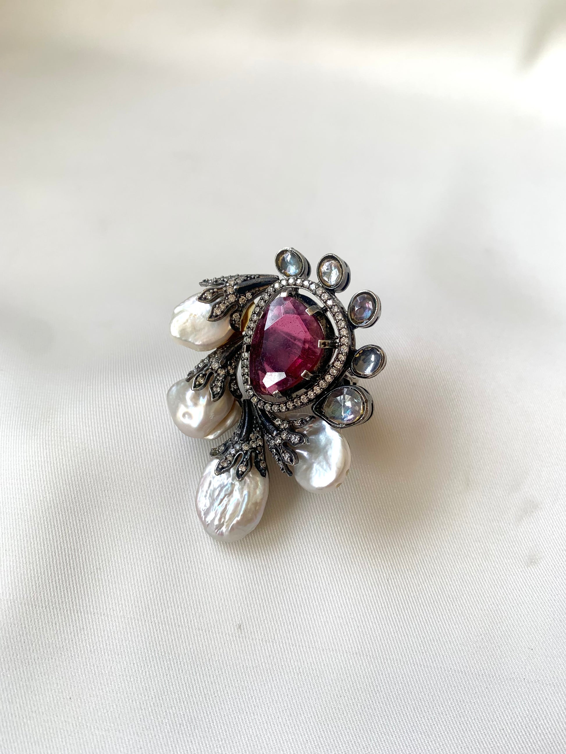 Shahana handcrafted rhodium oxidized cocktail ring with baroque pearls and semi-precious ruby