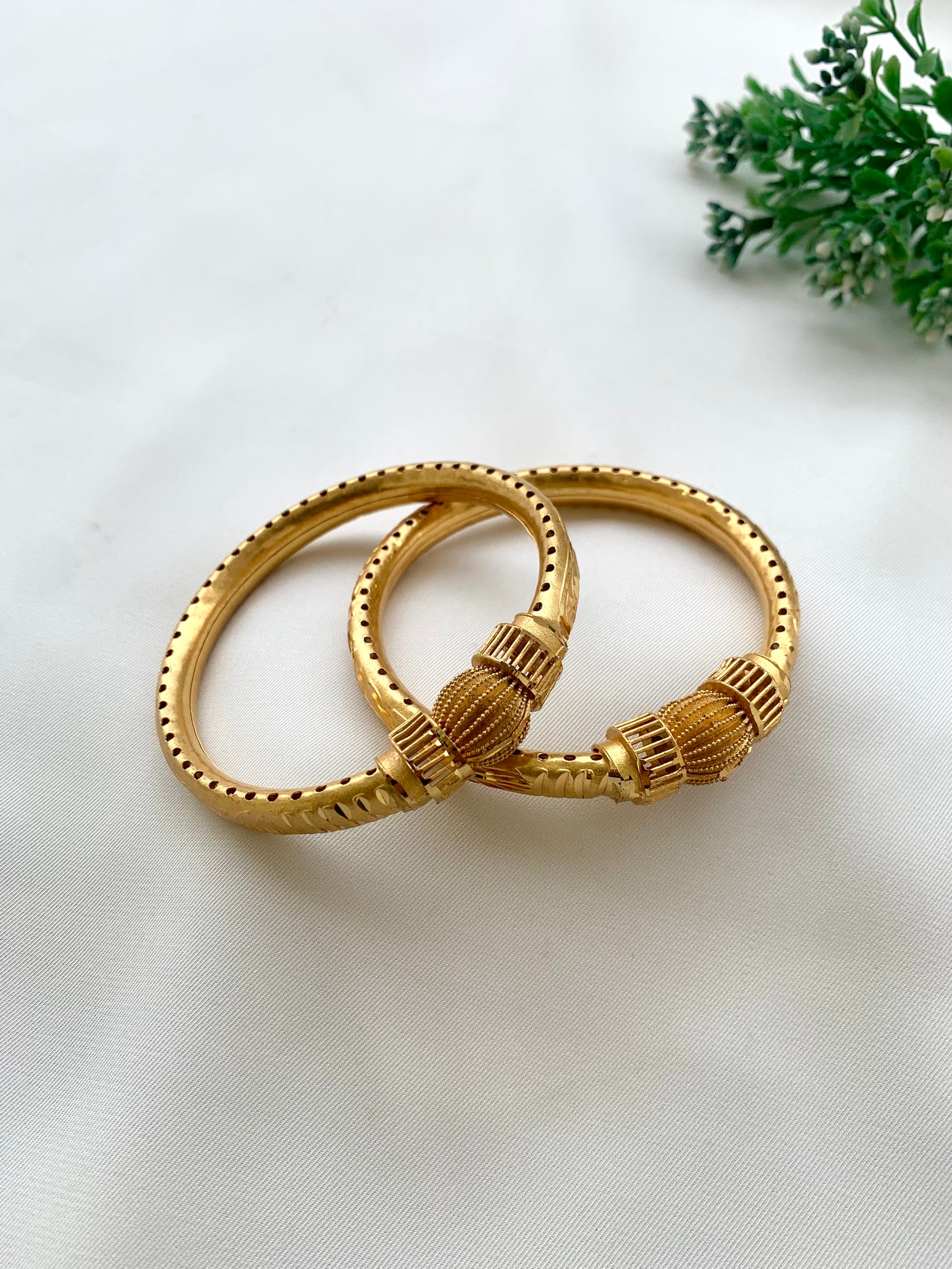 Shaina handcrafted lightweight 22kt gold plated bangles sold as a pair and available in sizes 2.4, 2.6, and 2.8