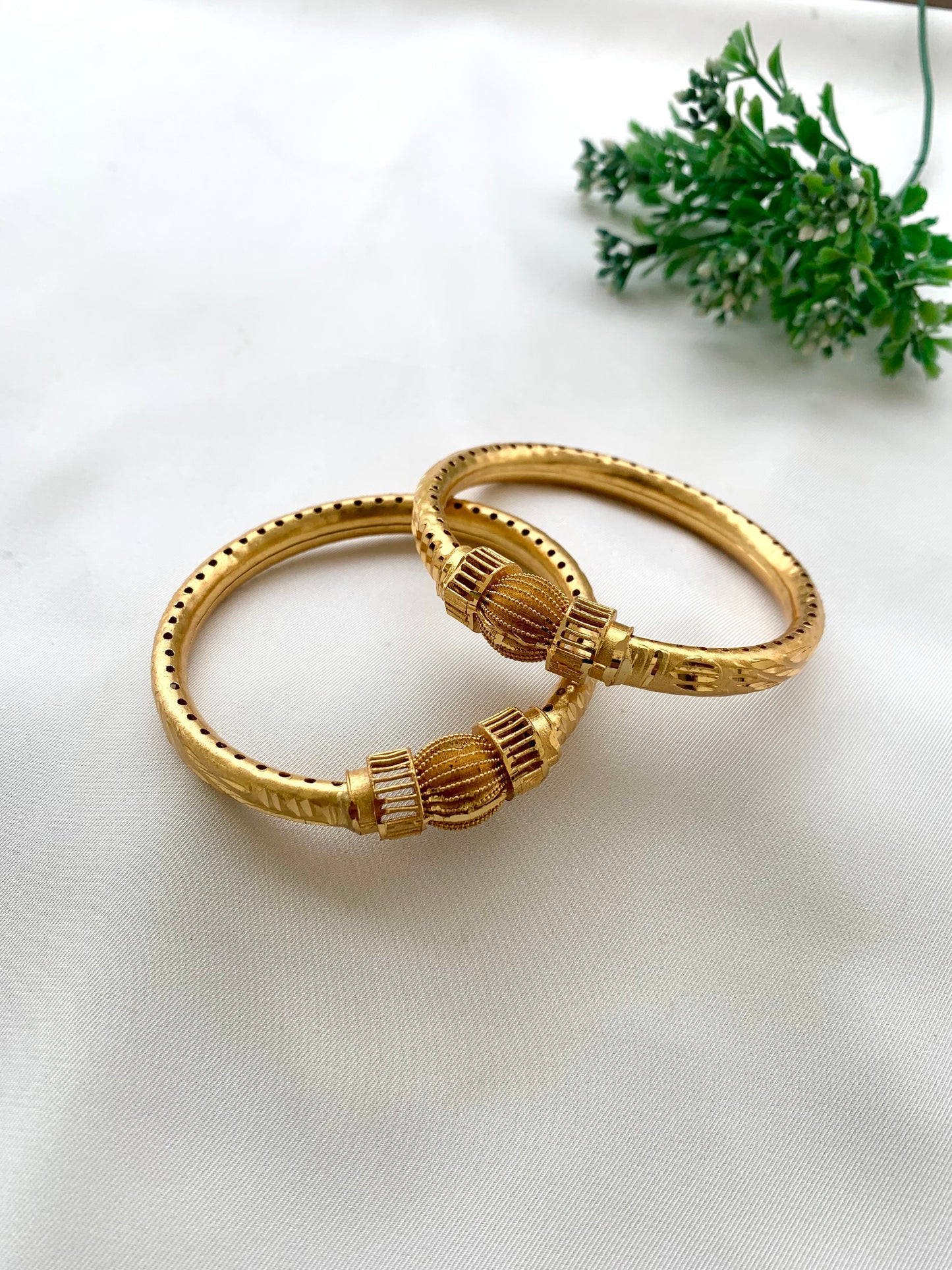 Shaina handcrafted lightweight 22kt gold plated bangles sold as a pair and available in sizes 2.4, 2.6, and 2.8