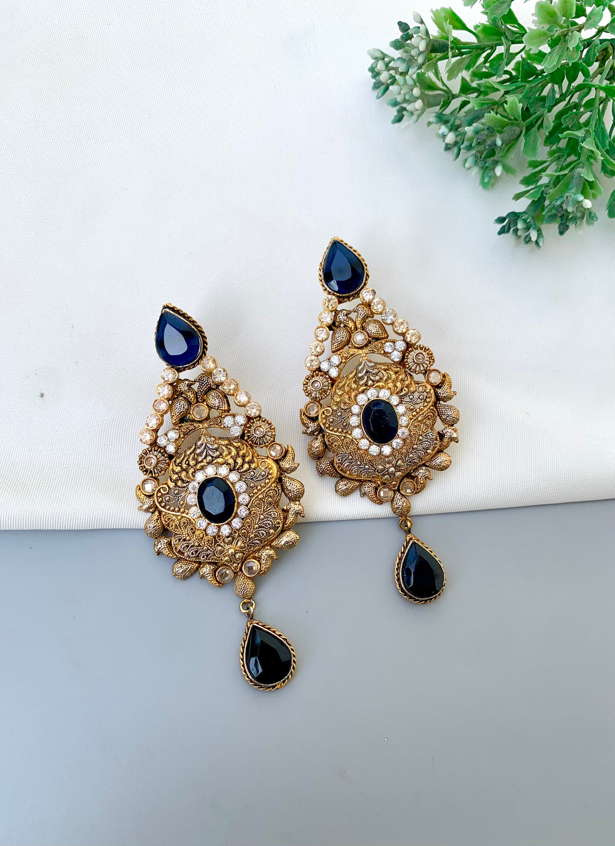 Sukaina handcrafted 22kt Gold plated earrings featuring Polki and Sapphire