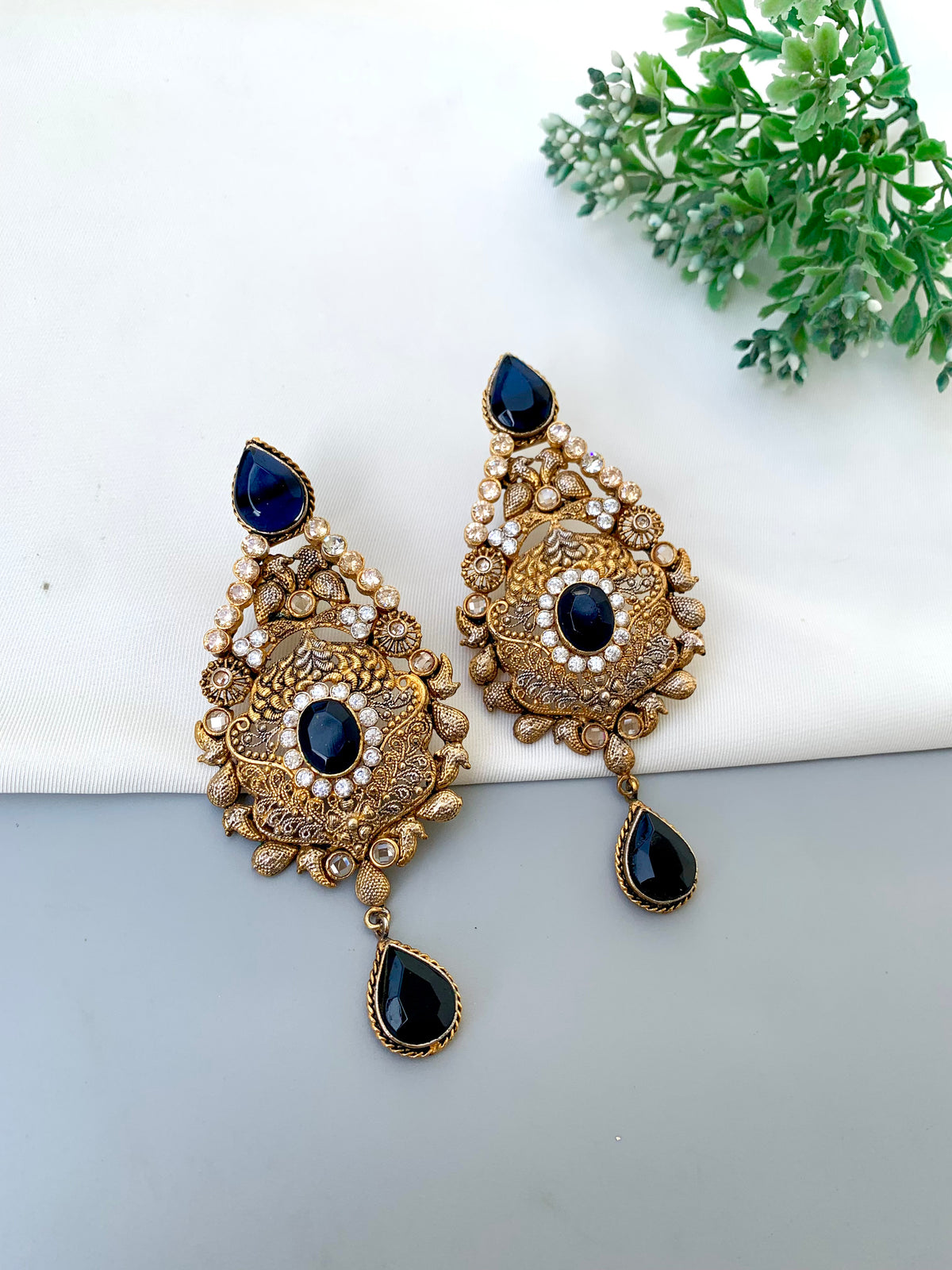 Sukaina handcrafted 22kt Gold plated earrings featuring Polki and Sapphire