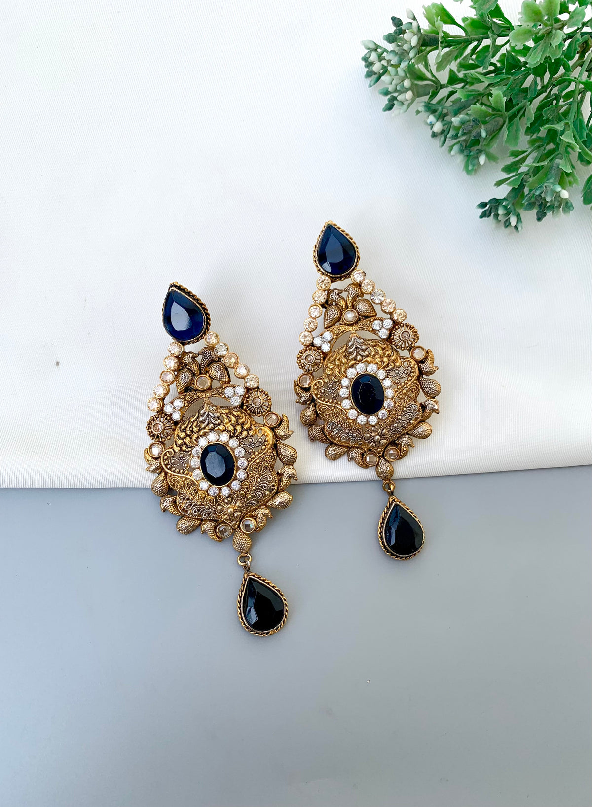 Sukaina handcrafted 22kt Gold plated earrings featuring Polki and Sapphire