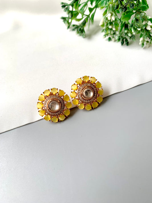 Handcrafted yellow studs in 22kt rose gold with Polki Kundan and American Diamonds