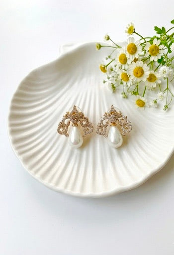 Veeda gold plated earrings with American diamonds and pearl accents