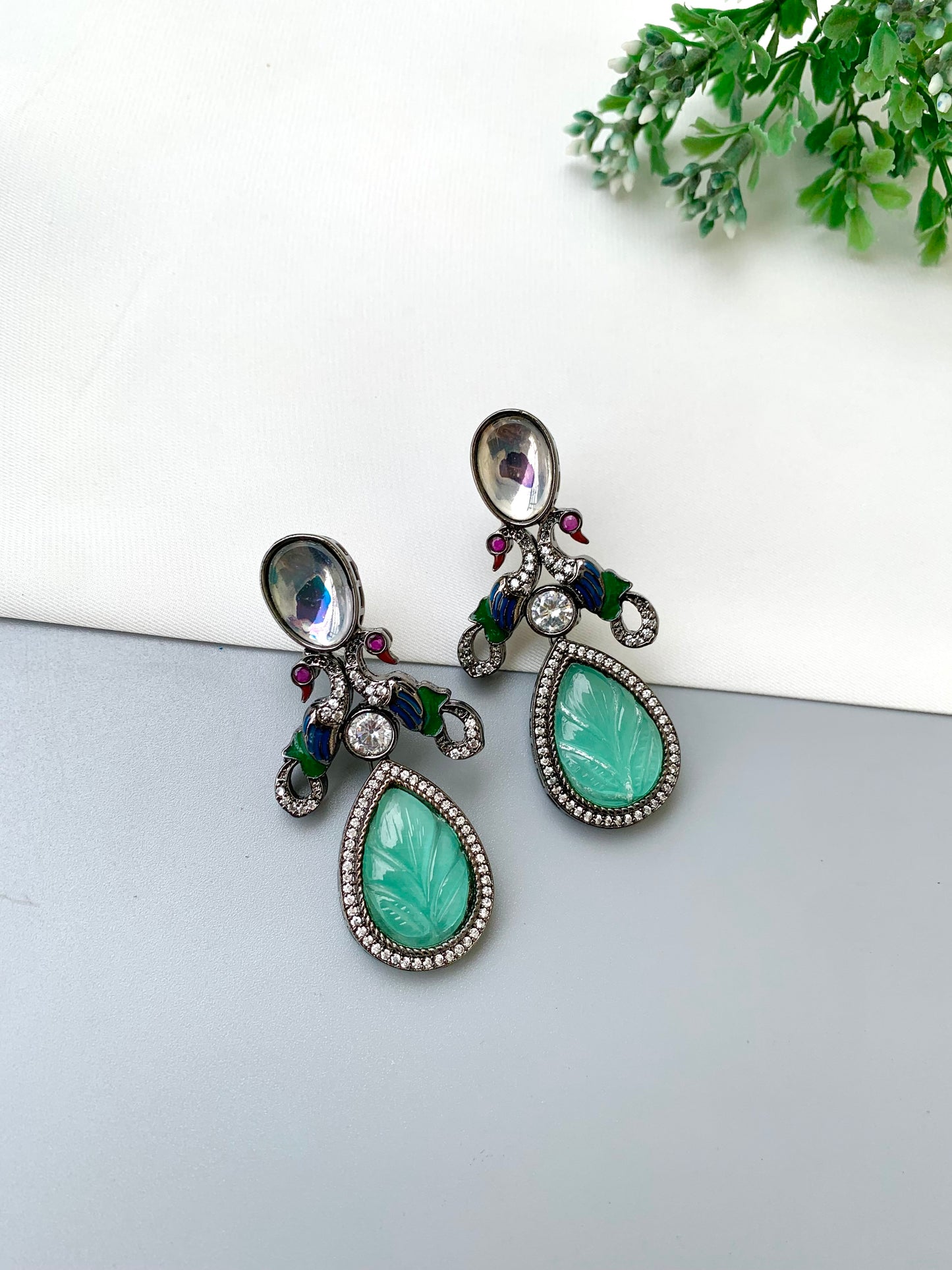 Vimsa handcrafted peacock earrings with American Diamonds, Polki Kundan and hand-carved semi-precious Onyx in black oxidized rhodium finish
