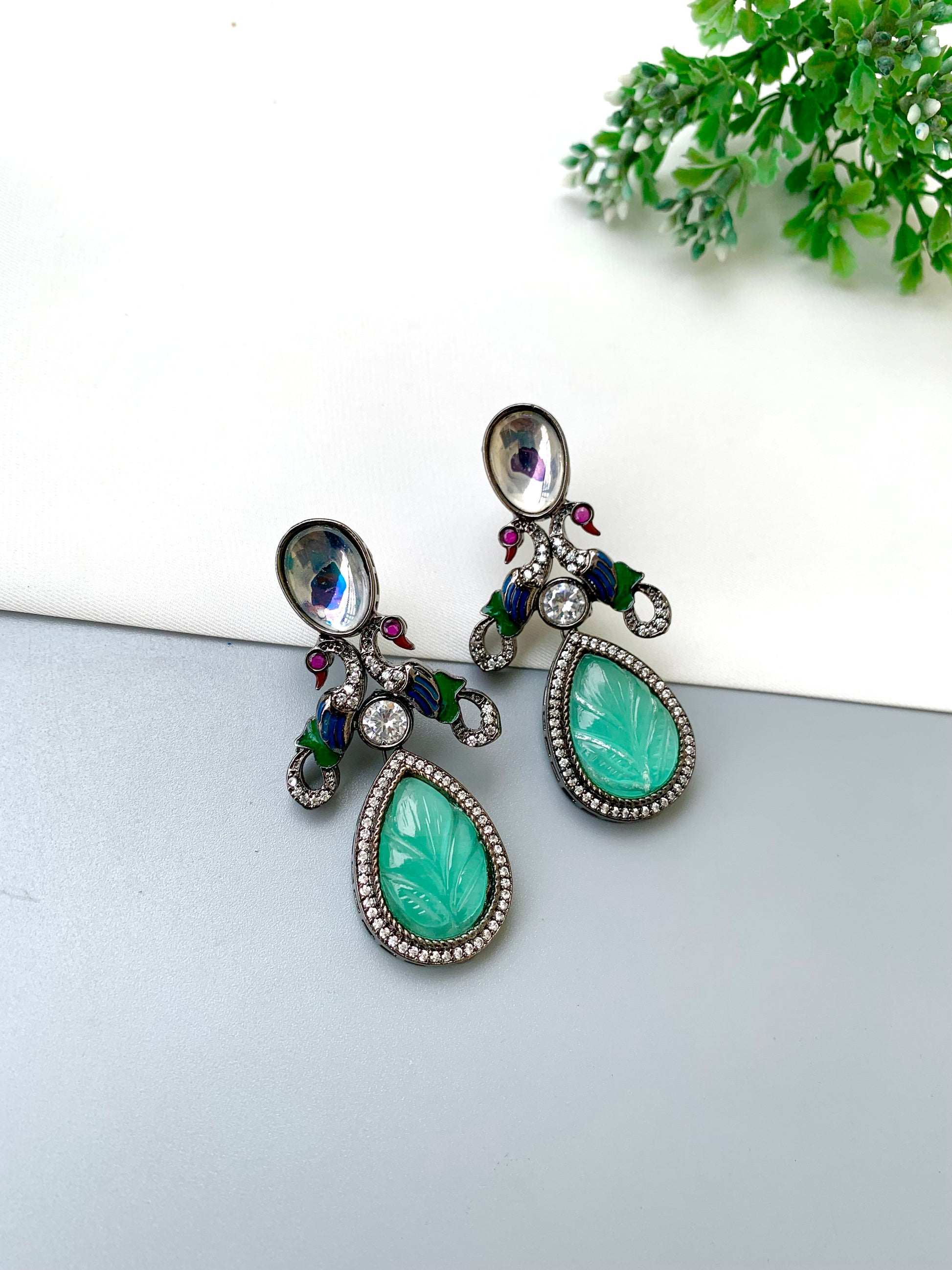 Vimsa handcrafted peacock earrings with American Diamonds, Polki Kundan and hand-carved semi-precious Onyx in black oxidized rhodium finish