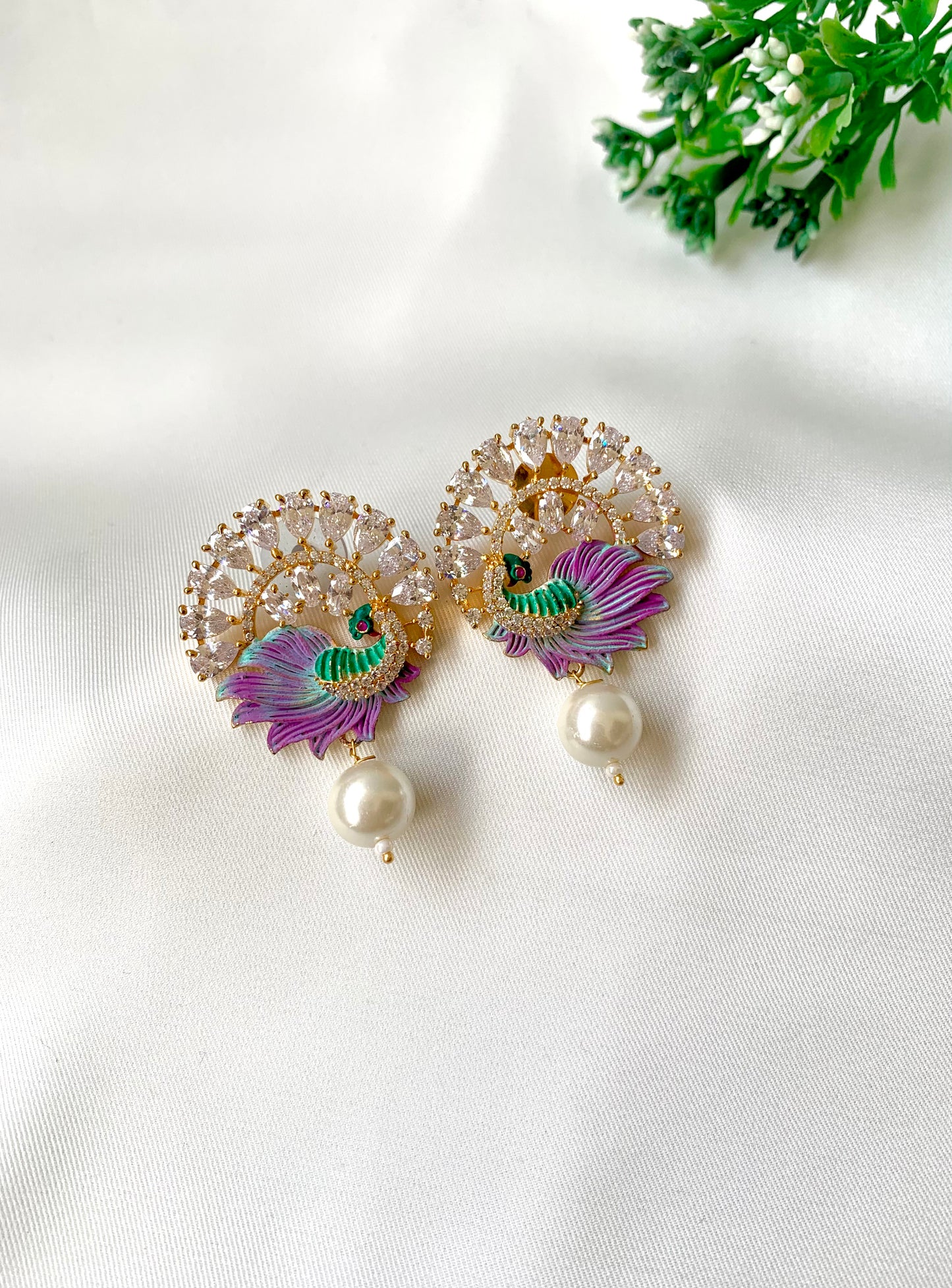 Hand crafted Vire  peacock designer earrings in 22kt gold plating with American Diamonds, semi-precious pearls and hand-painted Meena