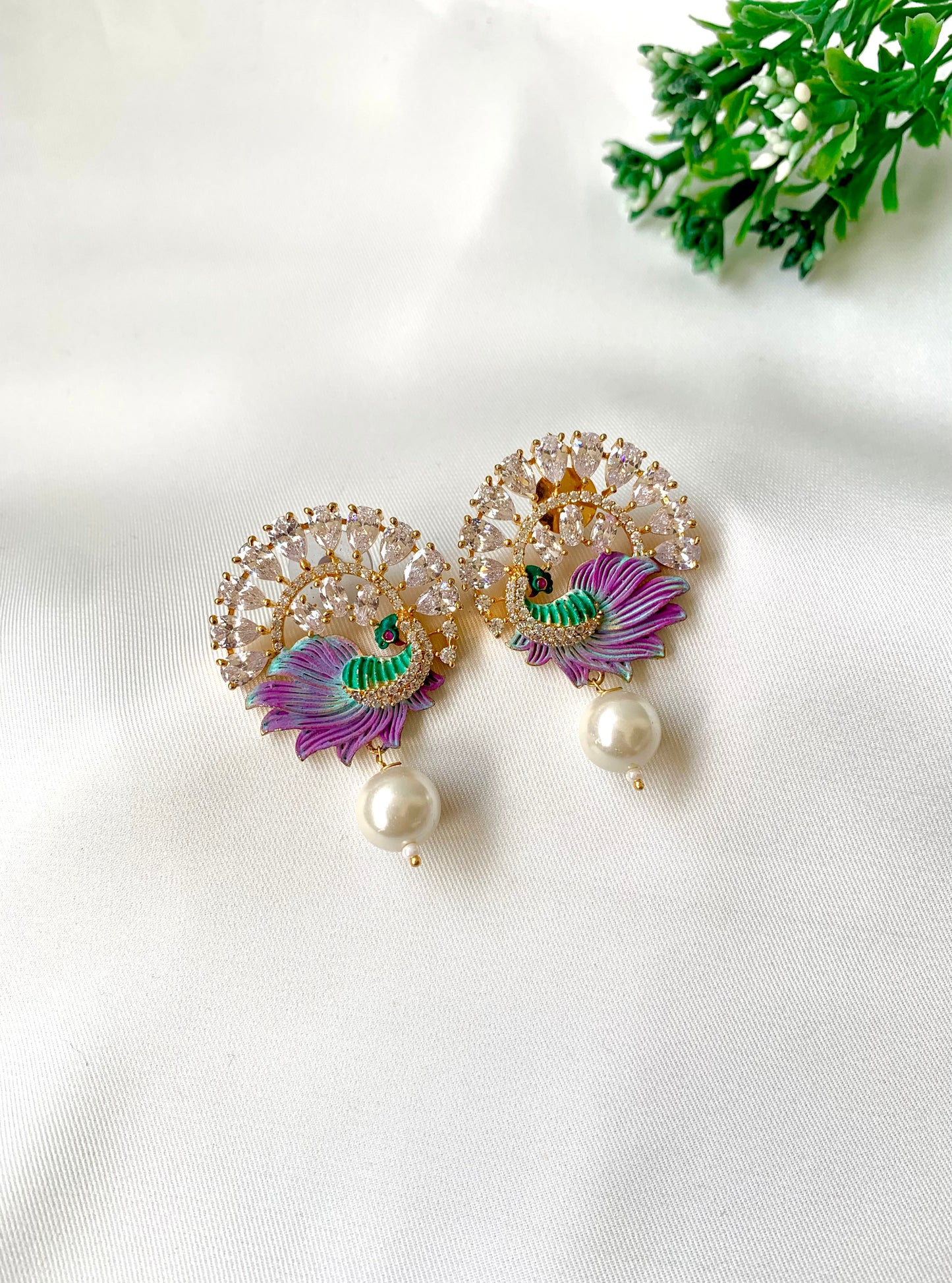 Hand crafted Vire  peacock designer earrings in 22kt gold plating with American Diamonds, semi-precious pearls and hand-painted Meena