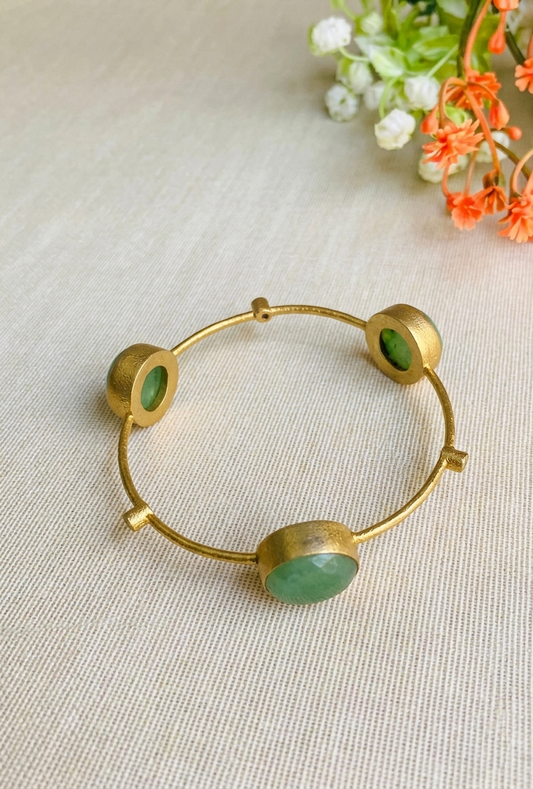 Visha gold plated bangle with semi precious natural gemstones in a minimalist design