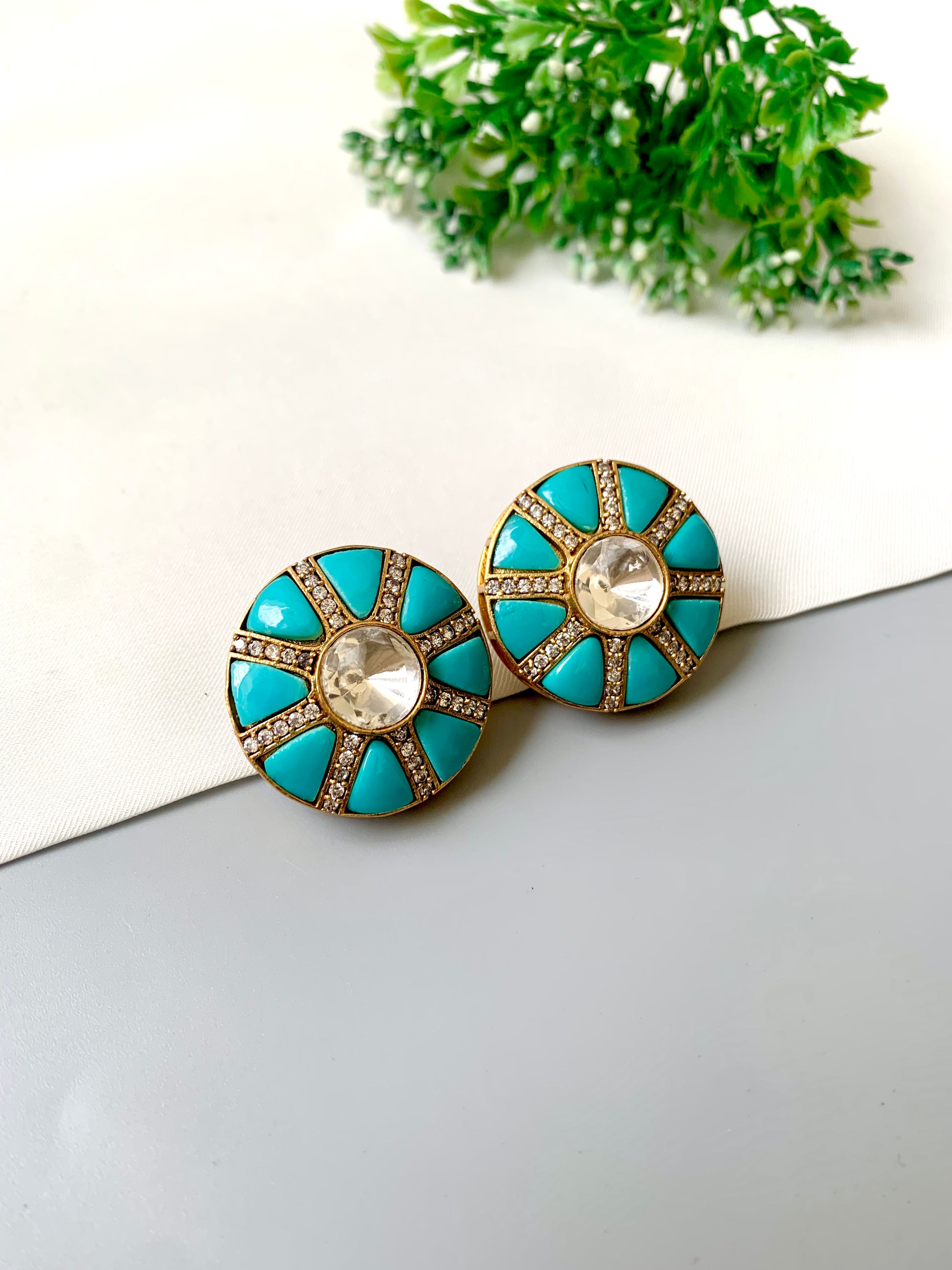 Close-up of Aftab Feroza Sunburst Studs showing pavé channels and bezel-set Polki — Zamal Jewels
