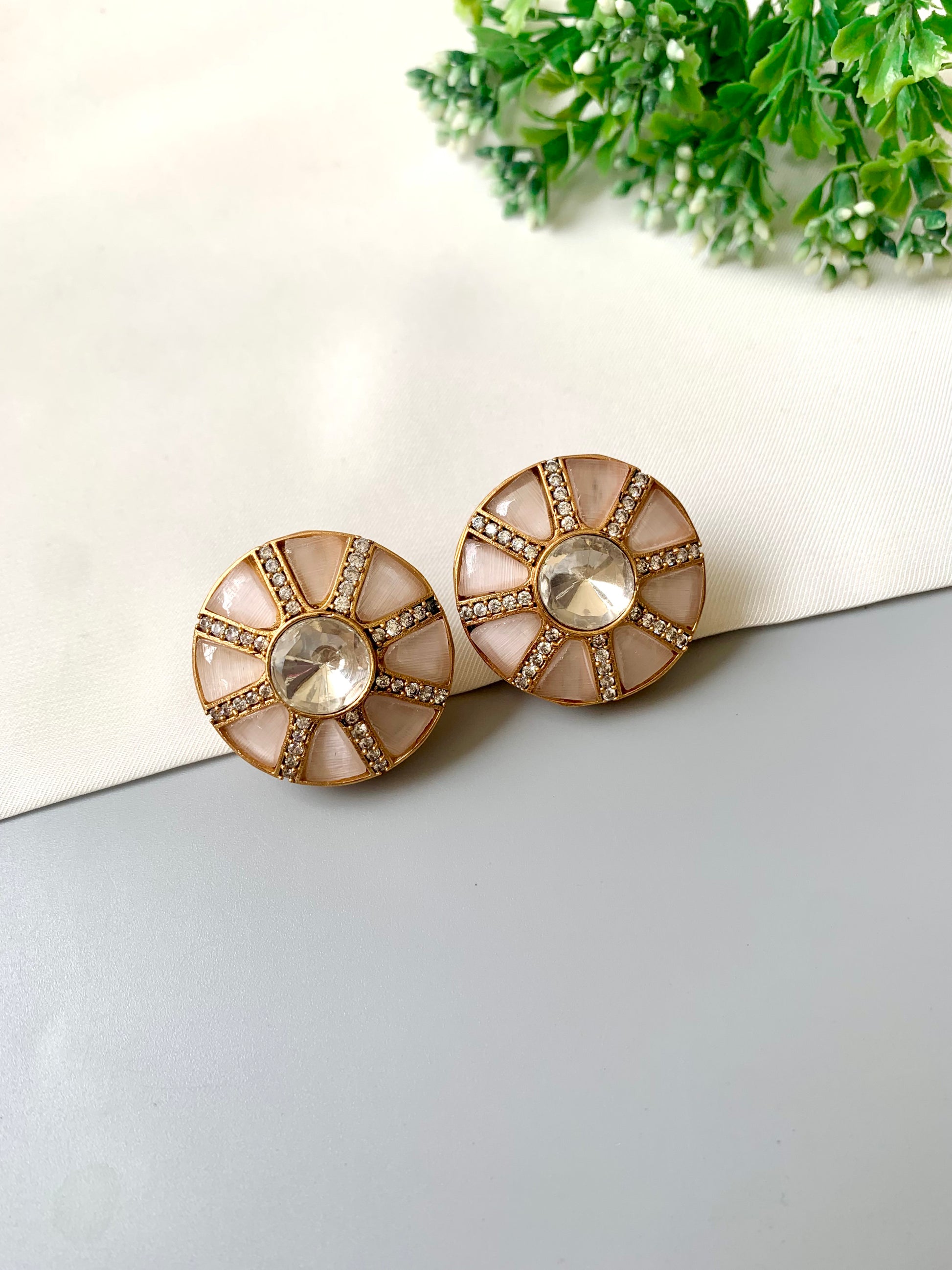 Close-up of Aftab Pink Fluorite Sunburst Studs showing pavé channels and high-polish gold finish — Zamal Jewels