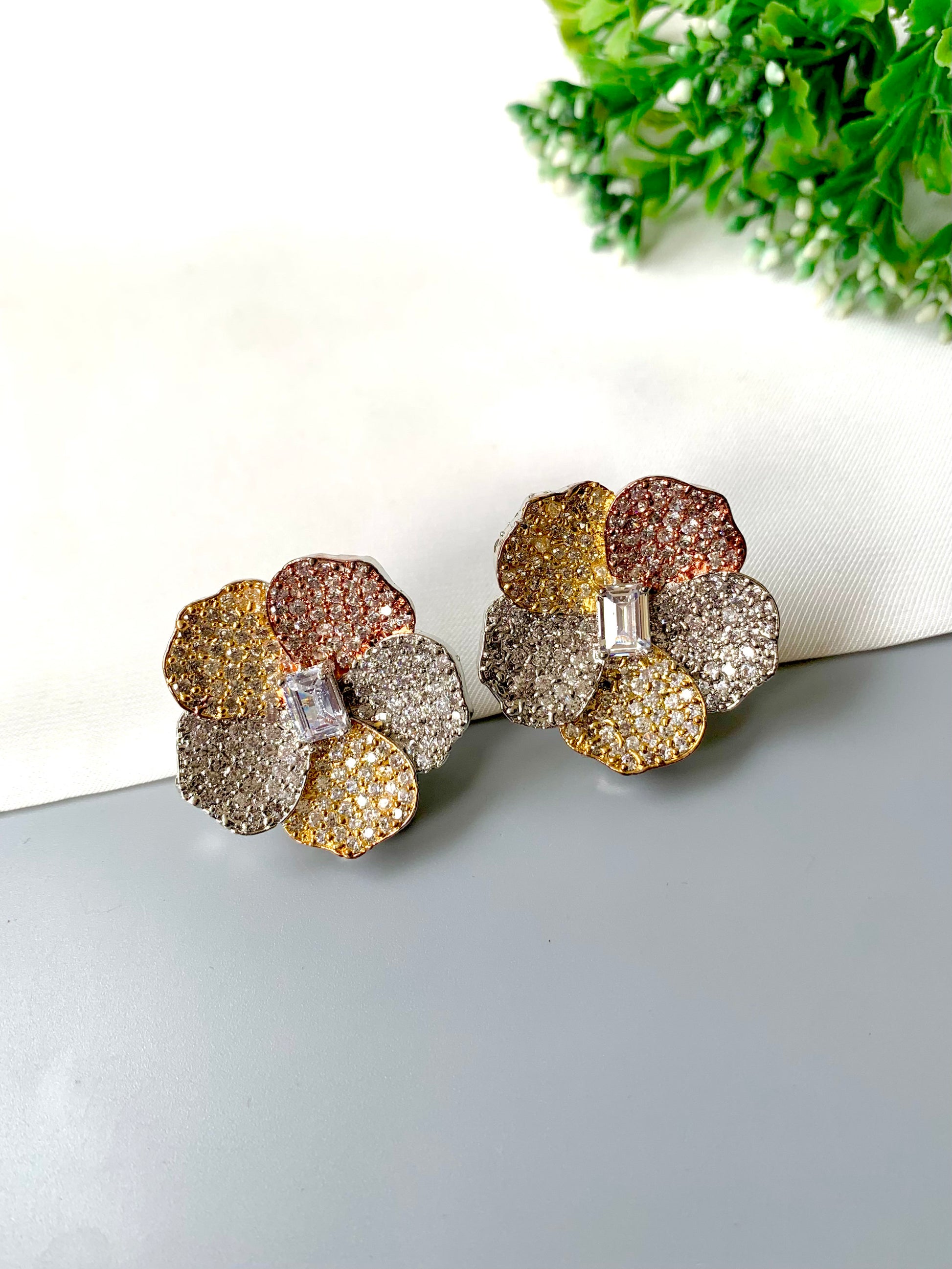 Hand-crafted pavé American Diamond blossom studs with baguette center in dual-tone 22kt gold and rose-gold — Zamal Jewels