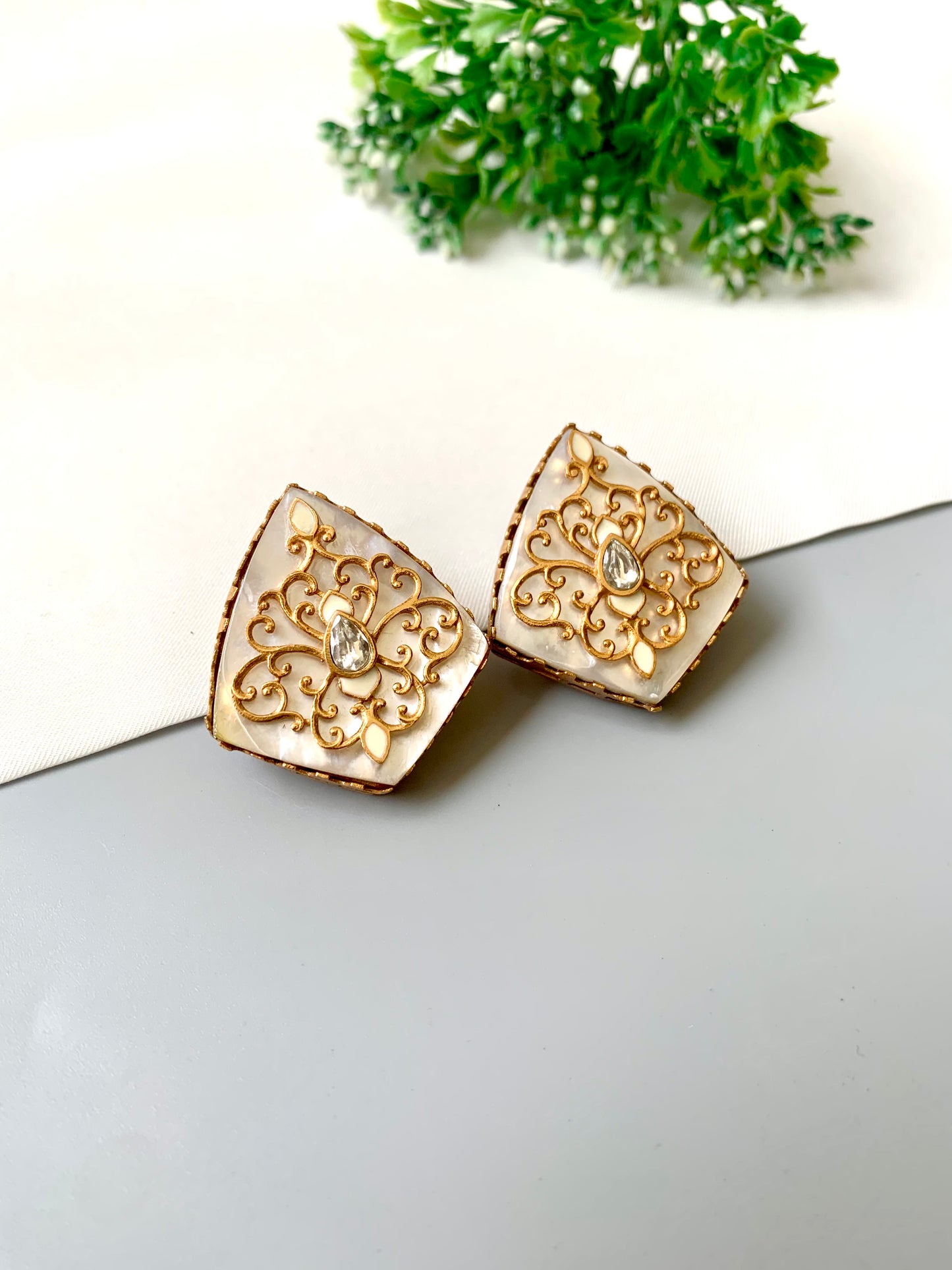 Close-up of Gul Meena Studs – MOP showing Meenakari detailing and high-polish 22k plating — Zamal Jewels