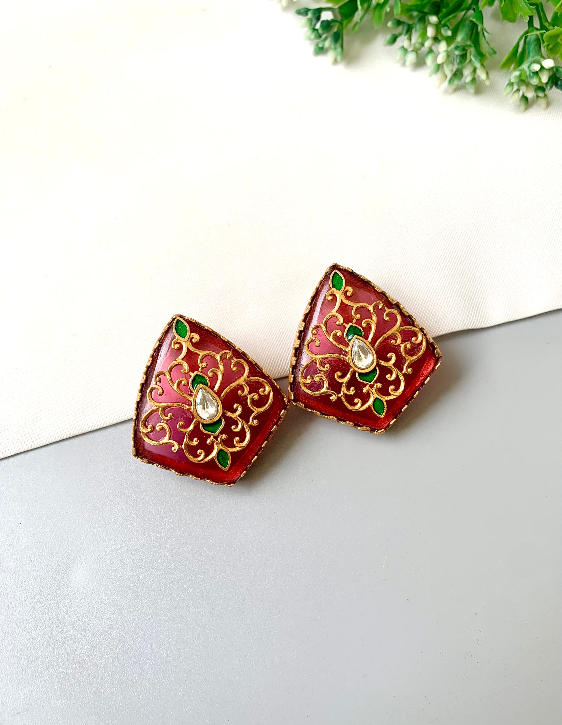 Ruby Meenakari studs with Moissanite Kundan centre and emerald accents in 22kt gold — Zamal Jewels