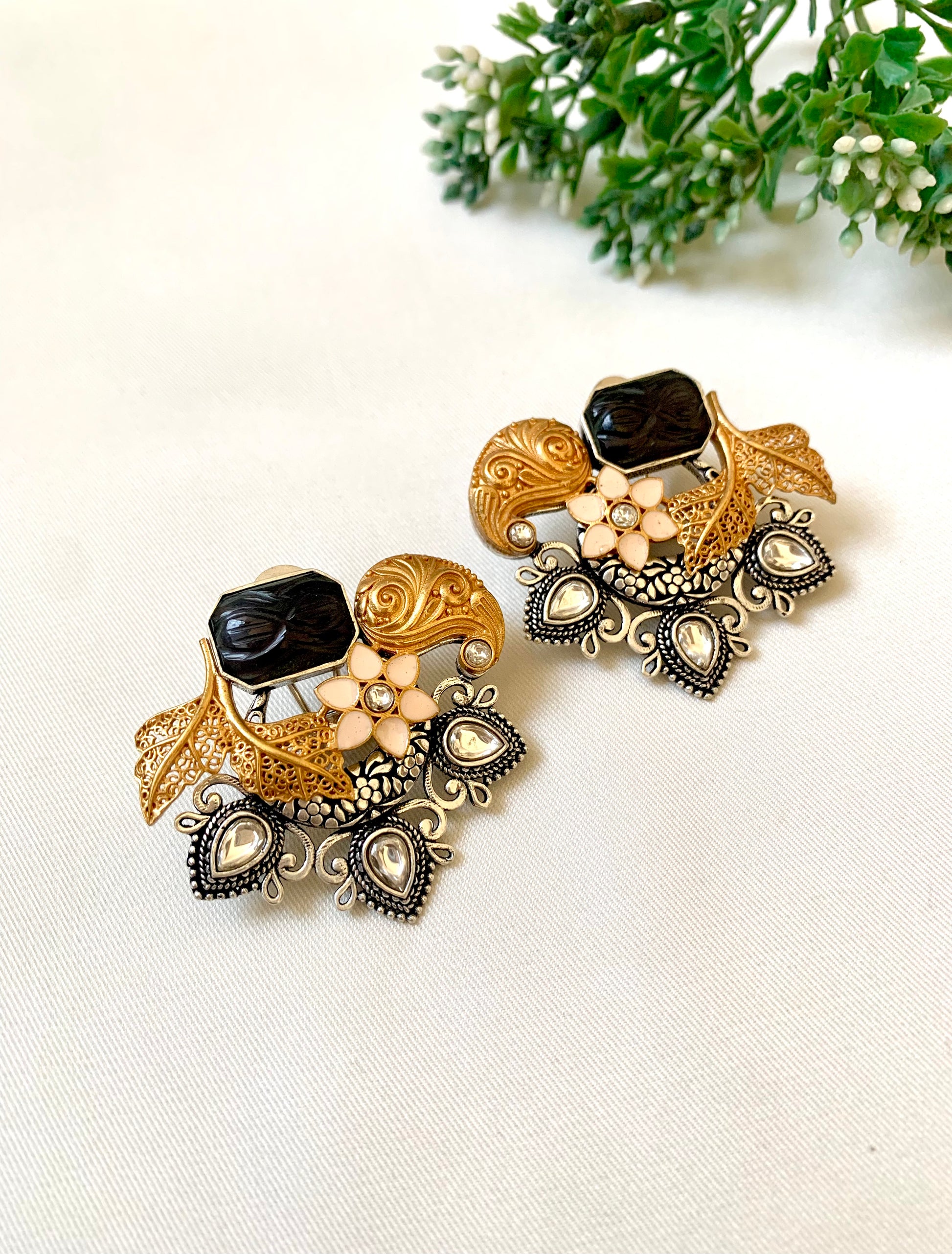 Asymmetric Jesiya studs with black onyx centre, enamel flower and Polki Kundan teardrops — Zamal Jewels