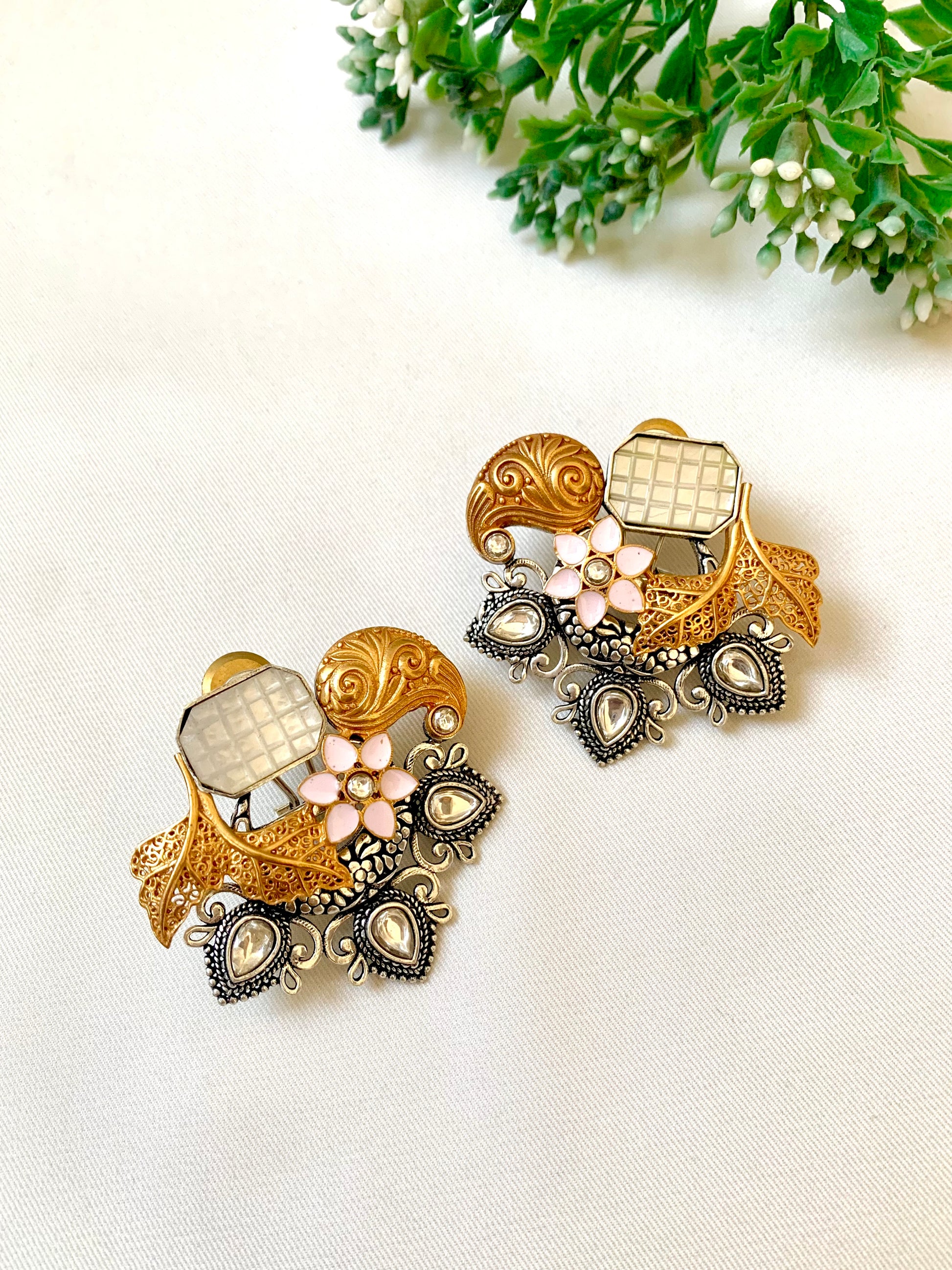Close-up of Jesiya studs highlighting Polki Kundan teardrops and enamel flower — Zamal Jewels